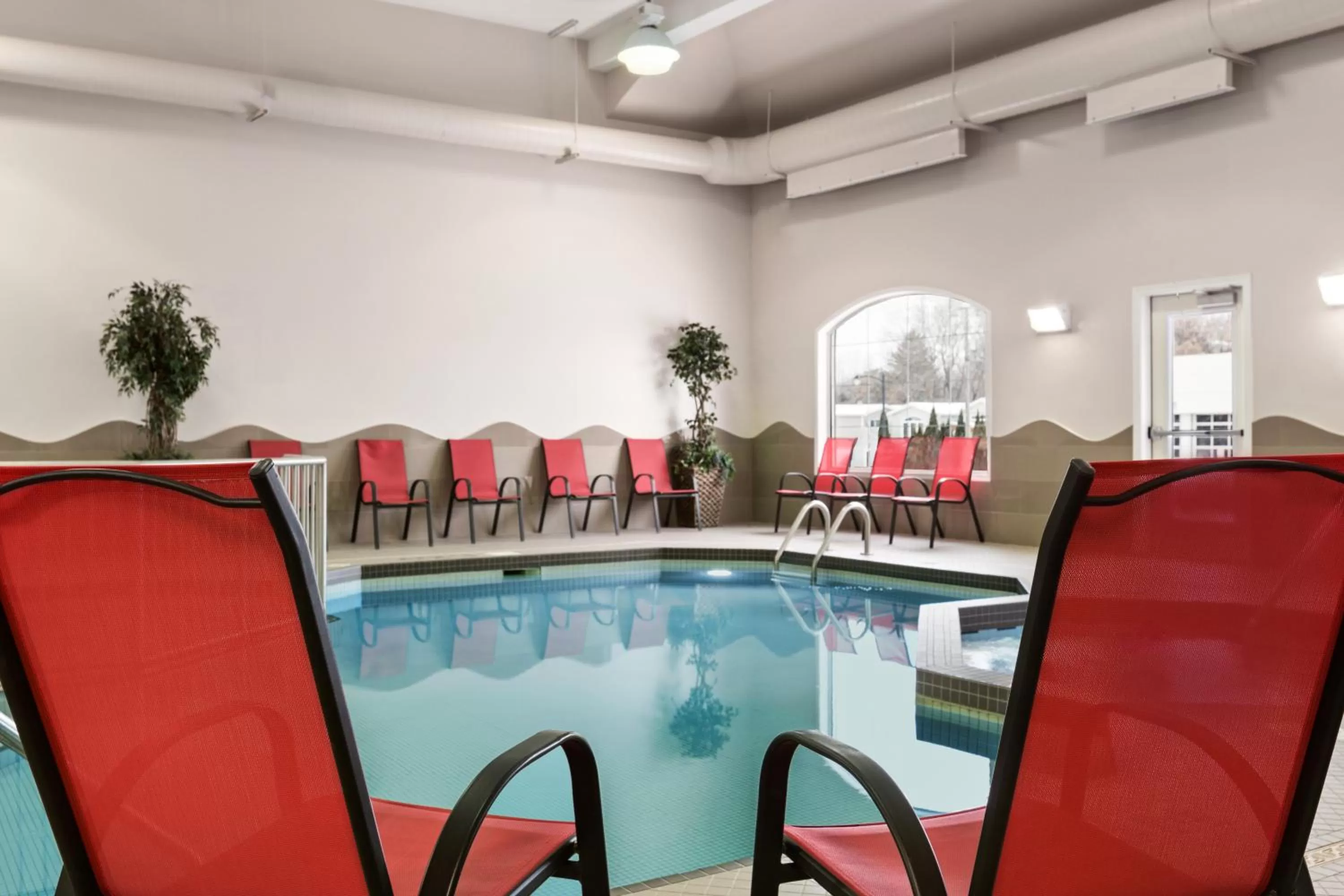 Swimming pool in Days Inn & Suites by Wyndham Brandon