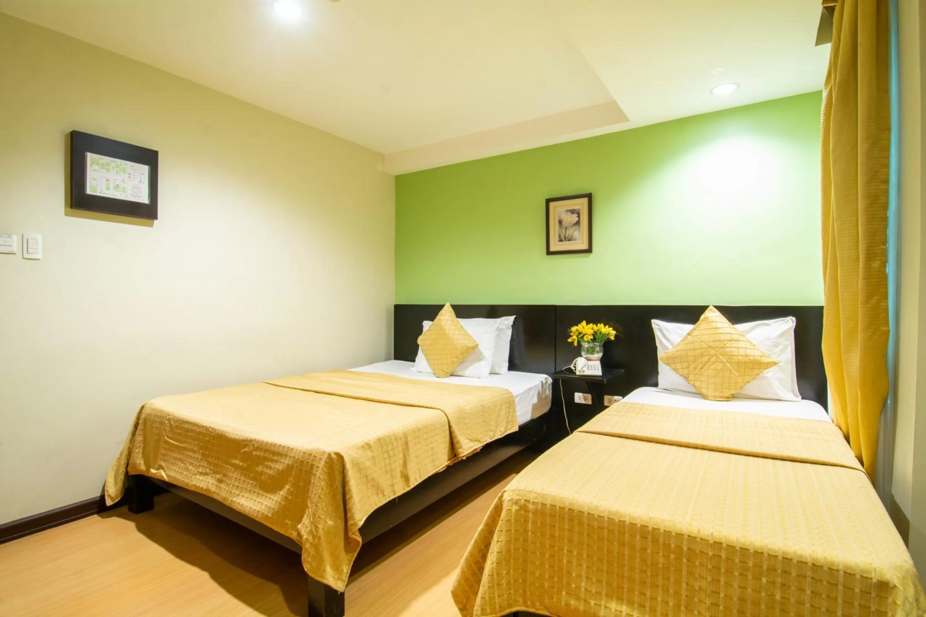 Bed in Festive Hotel Makati