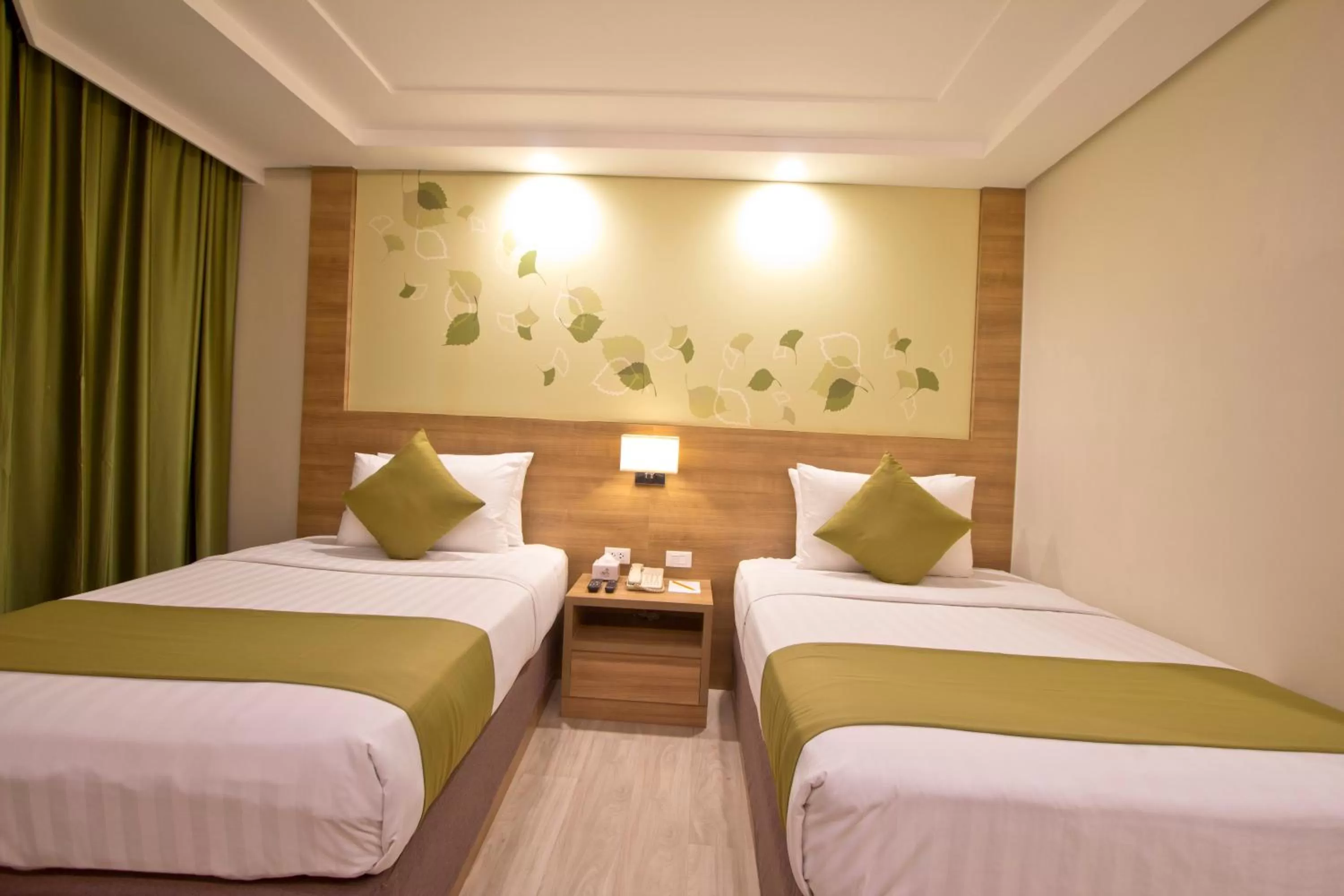 Bed in Crown Regency Hotel Makati