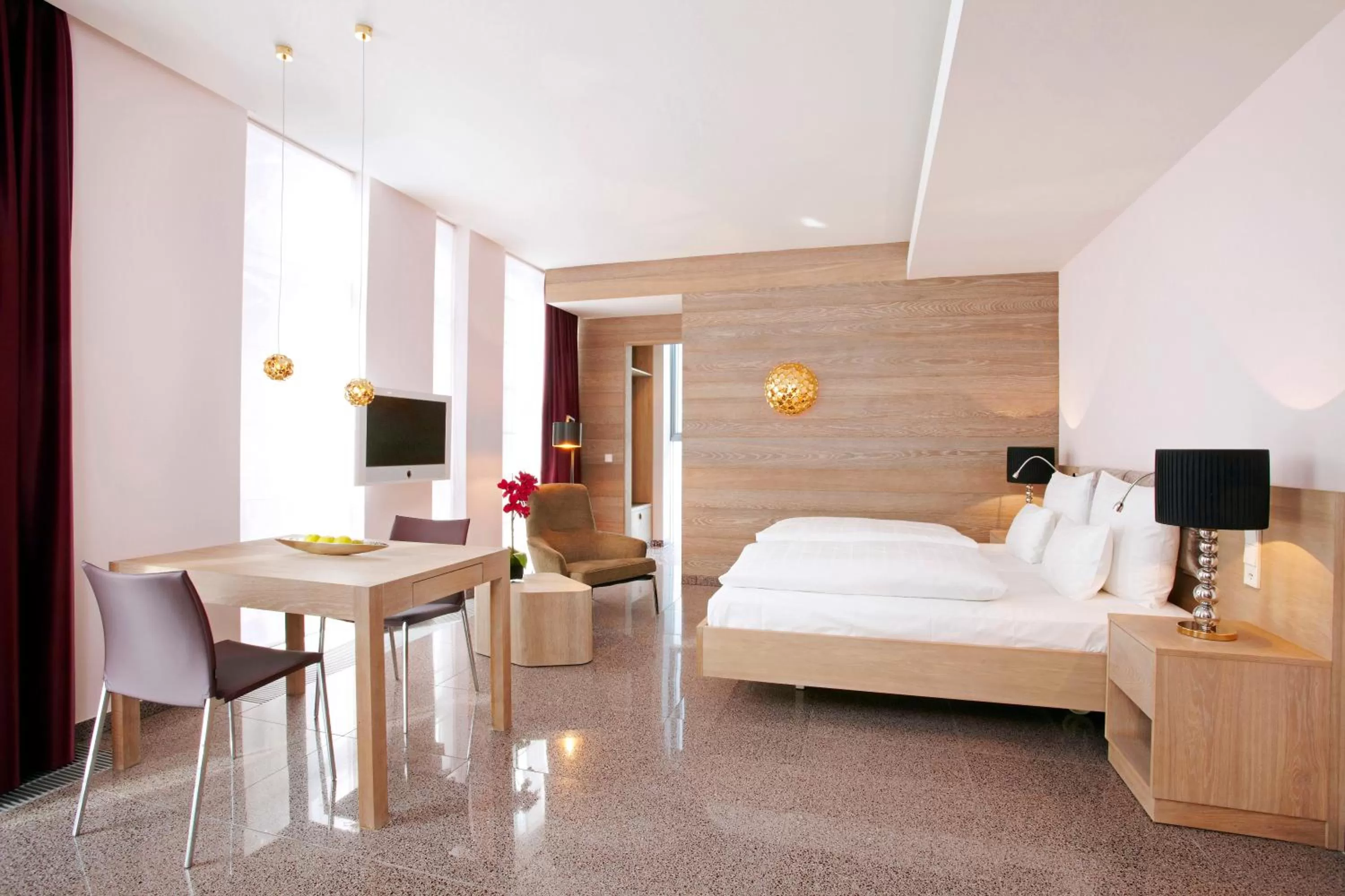 Photo of the whole room, Bed in abito Suites