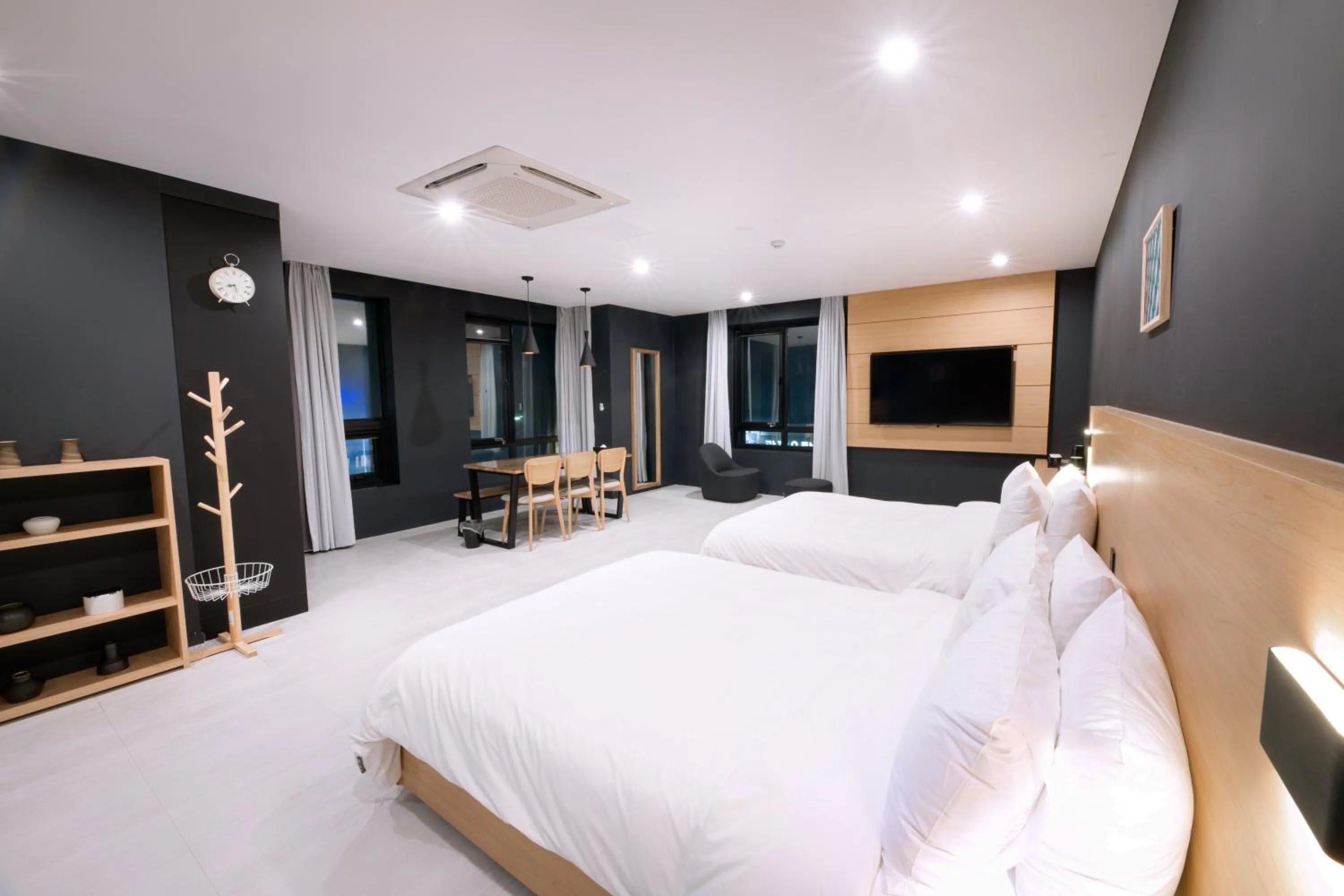 Bed in Mipo Oceanside Hotel