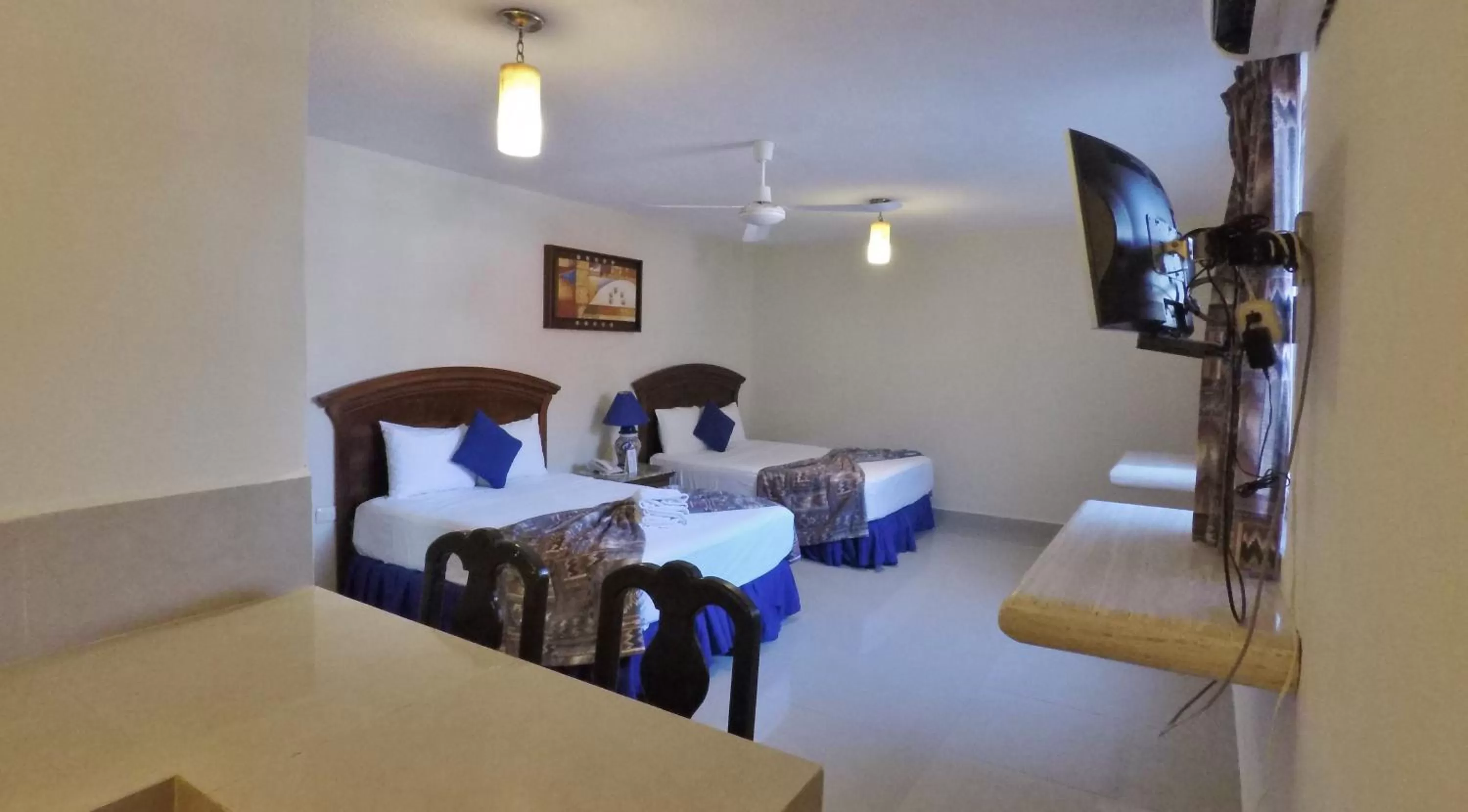 Photo of the whole room, Bed in Hotel El Campanario Playa del Carmen