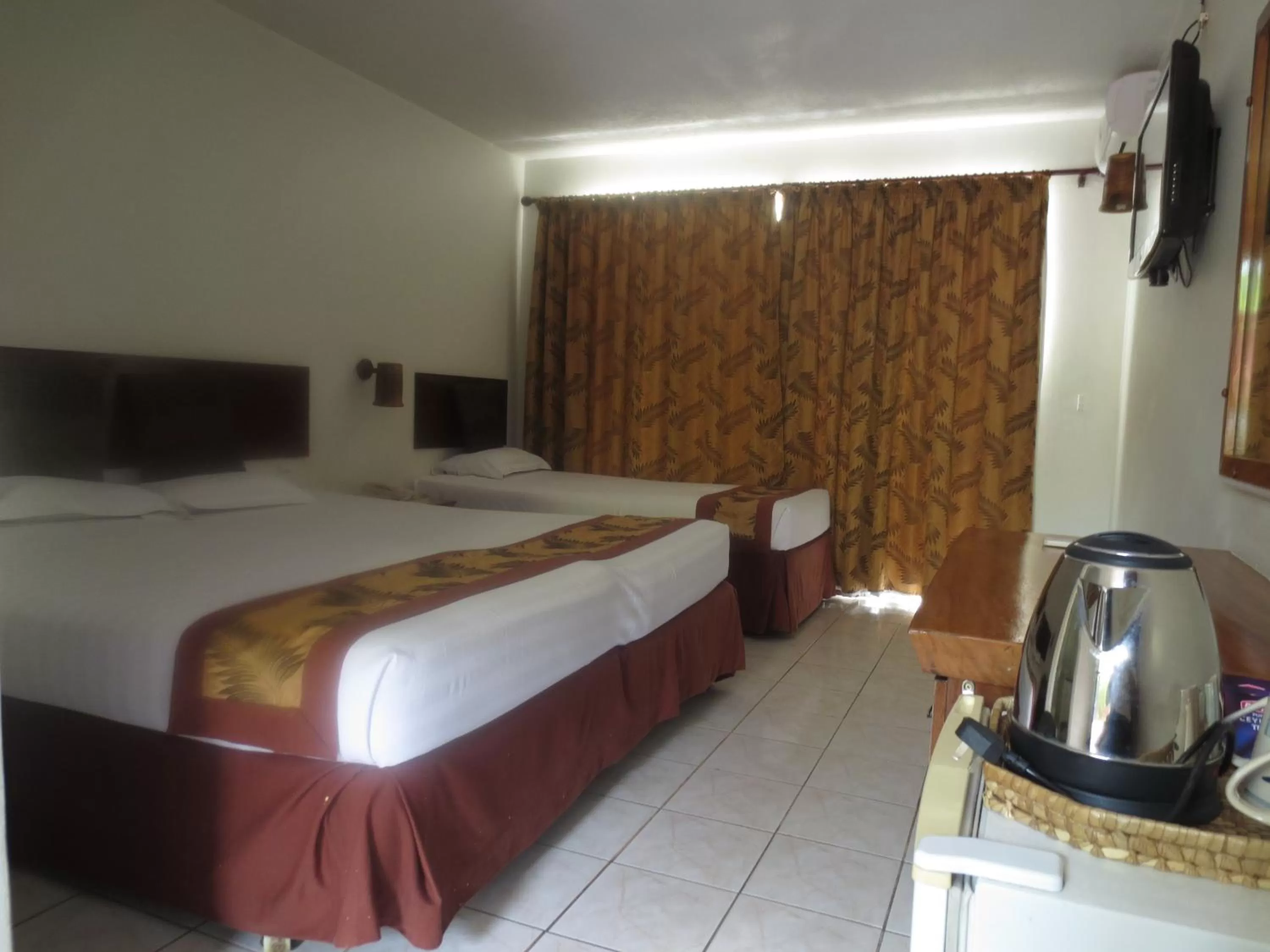 Bed in Capricorn International Hotel