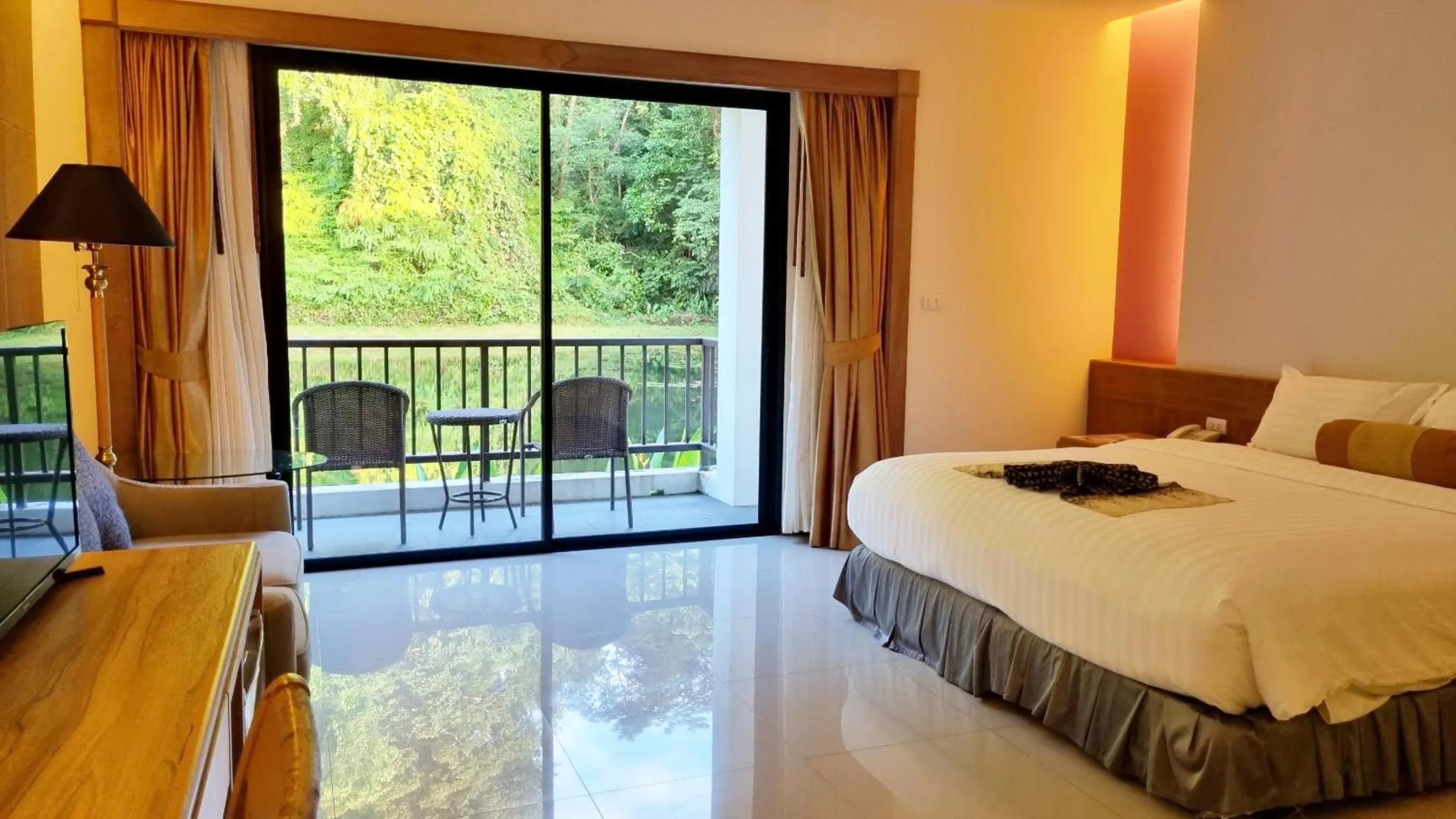 View (from property/room), Bed in Tinidee Golf Resort Phuket