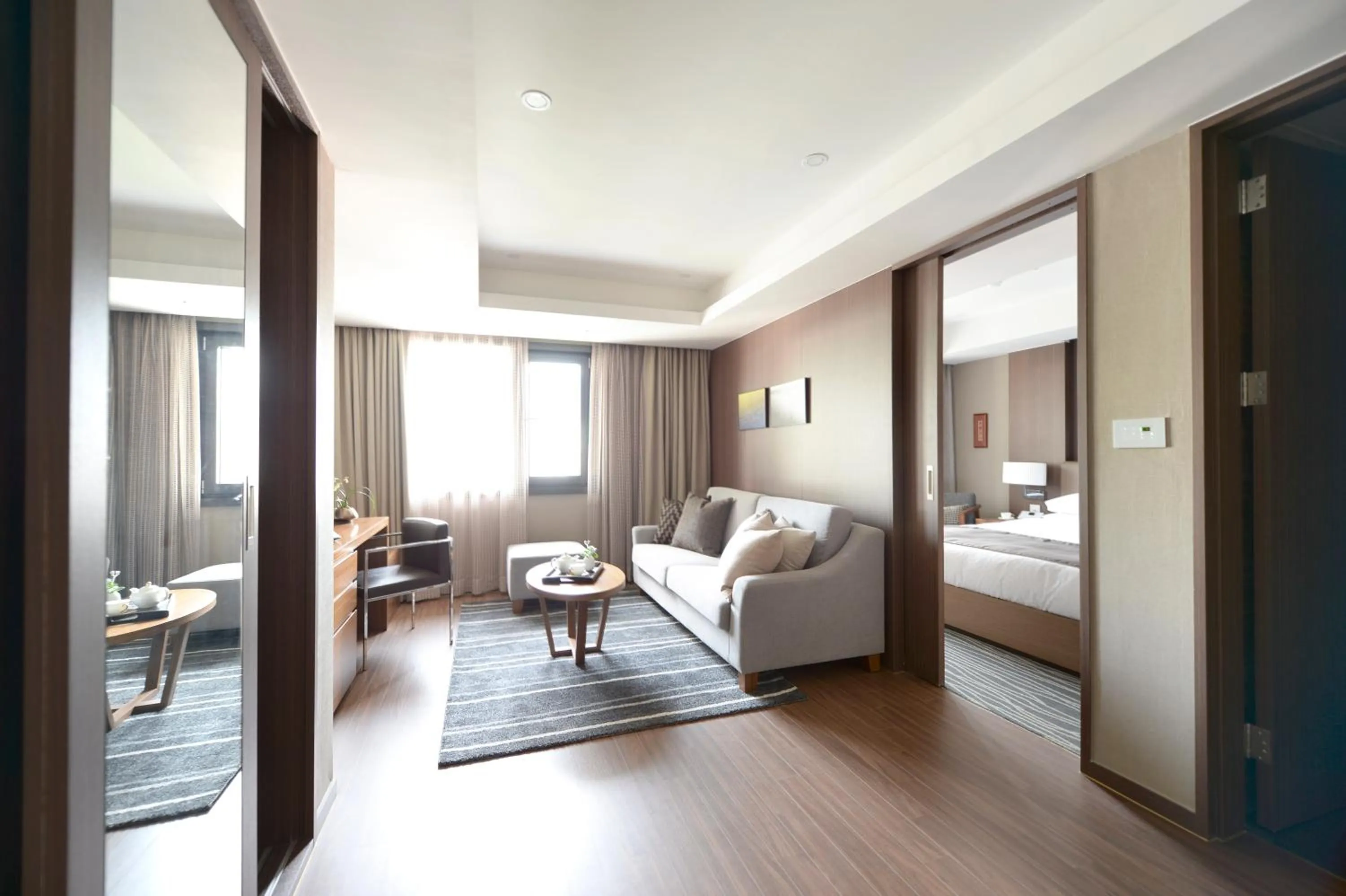 Living room, Bed in Busan Business Hotel