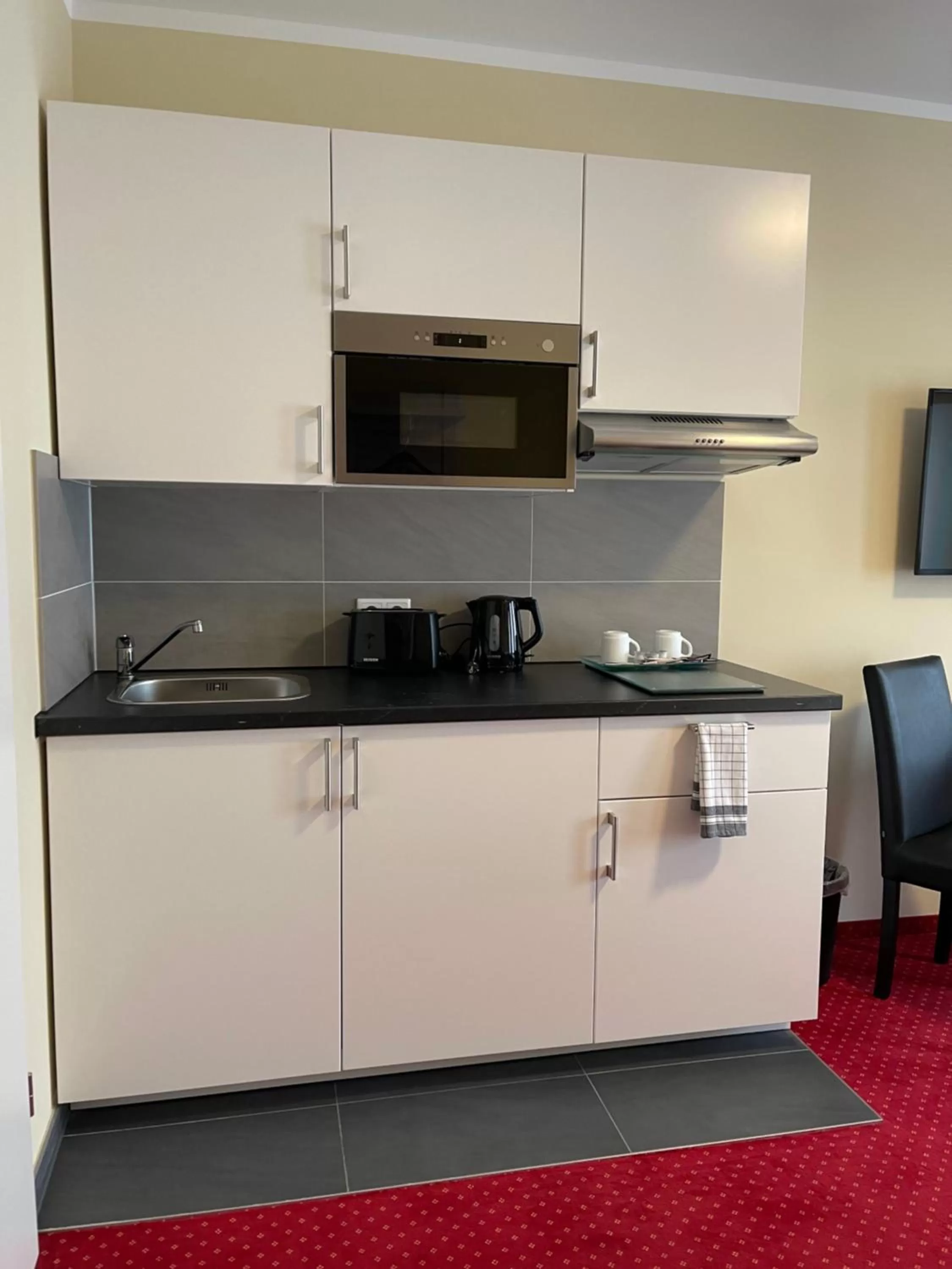 Kitchen or kitchenette in Palm Premium Hotel & Apartments