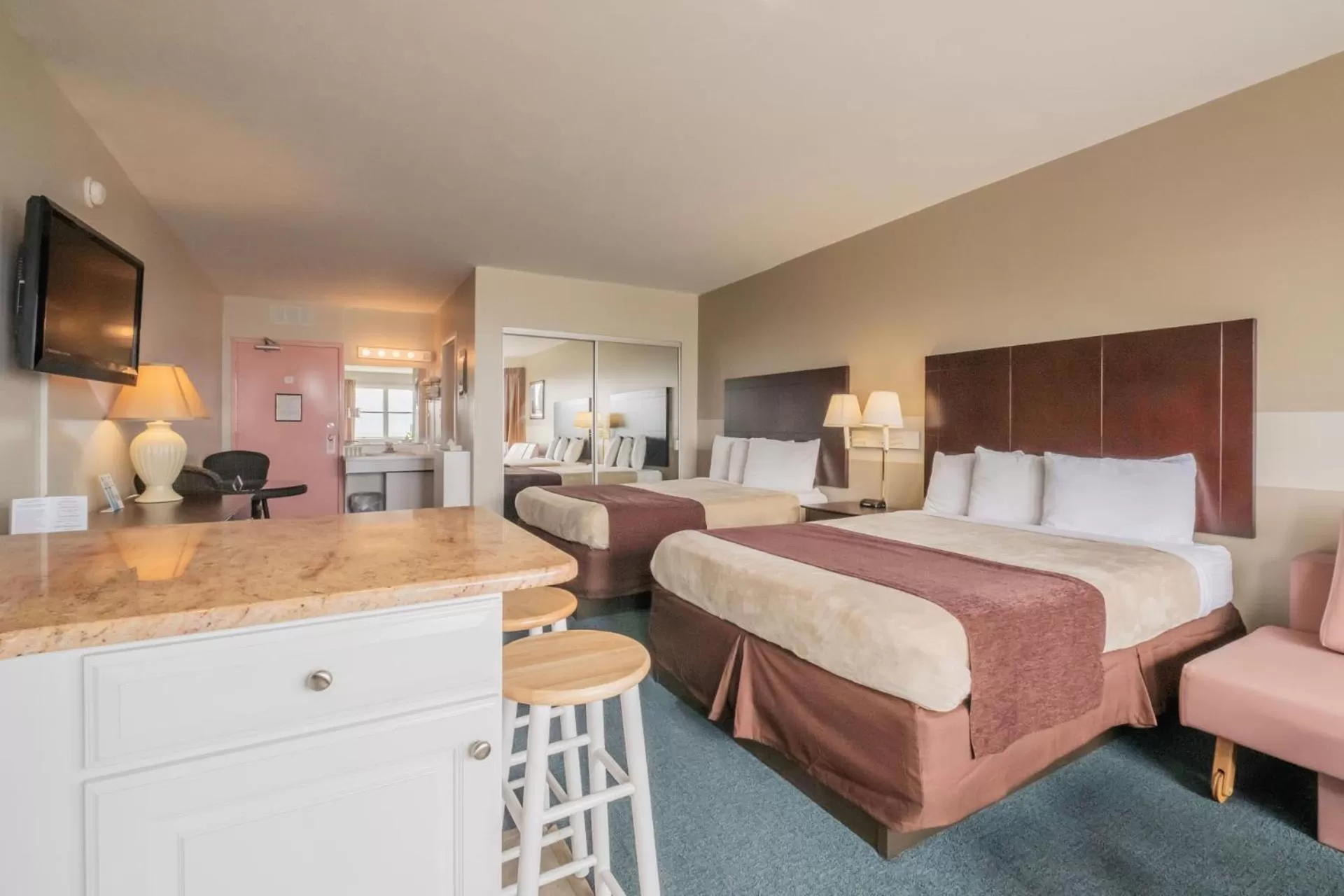 Bed in Heart of Wildwood Boardwalk Motel