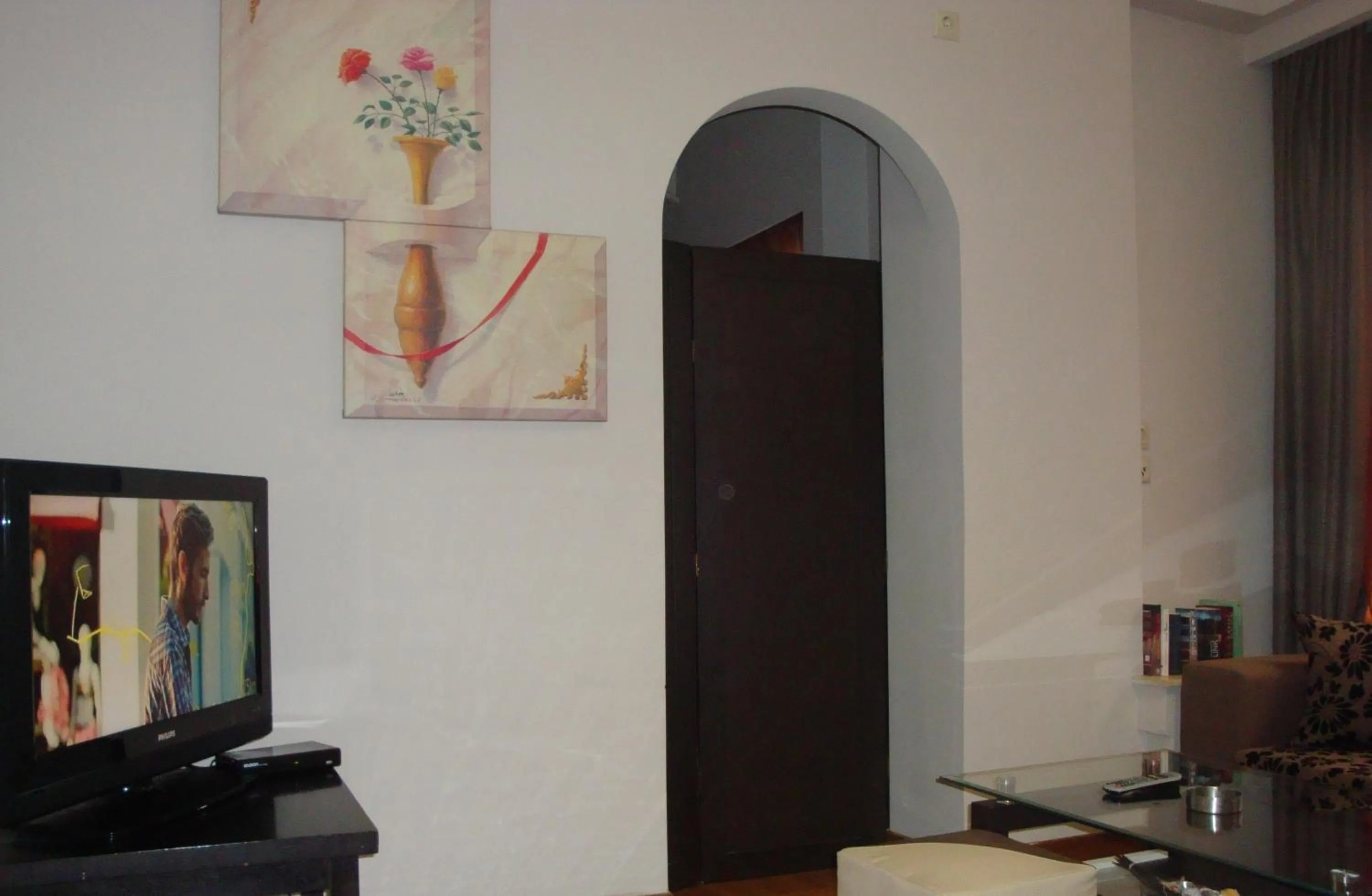 Communal lounge/ TV room in Ambrosia Suites