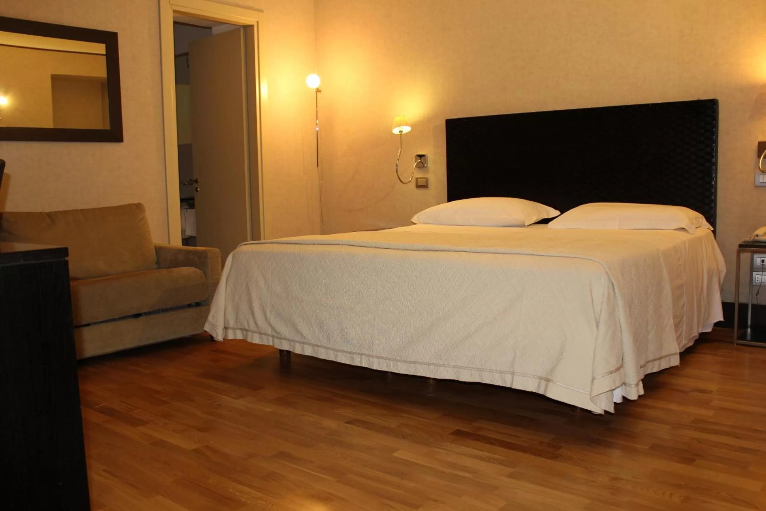 Photo of the whole room, Bed in MH Design Hotel