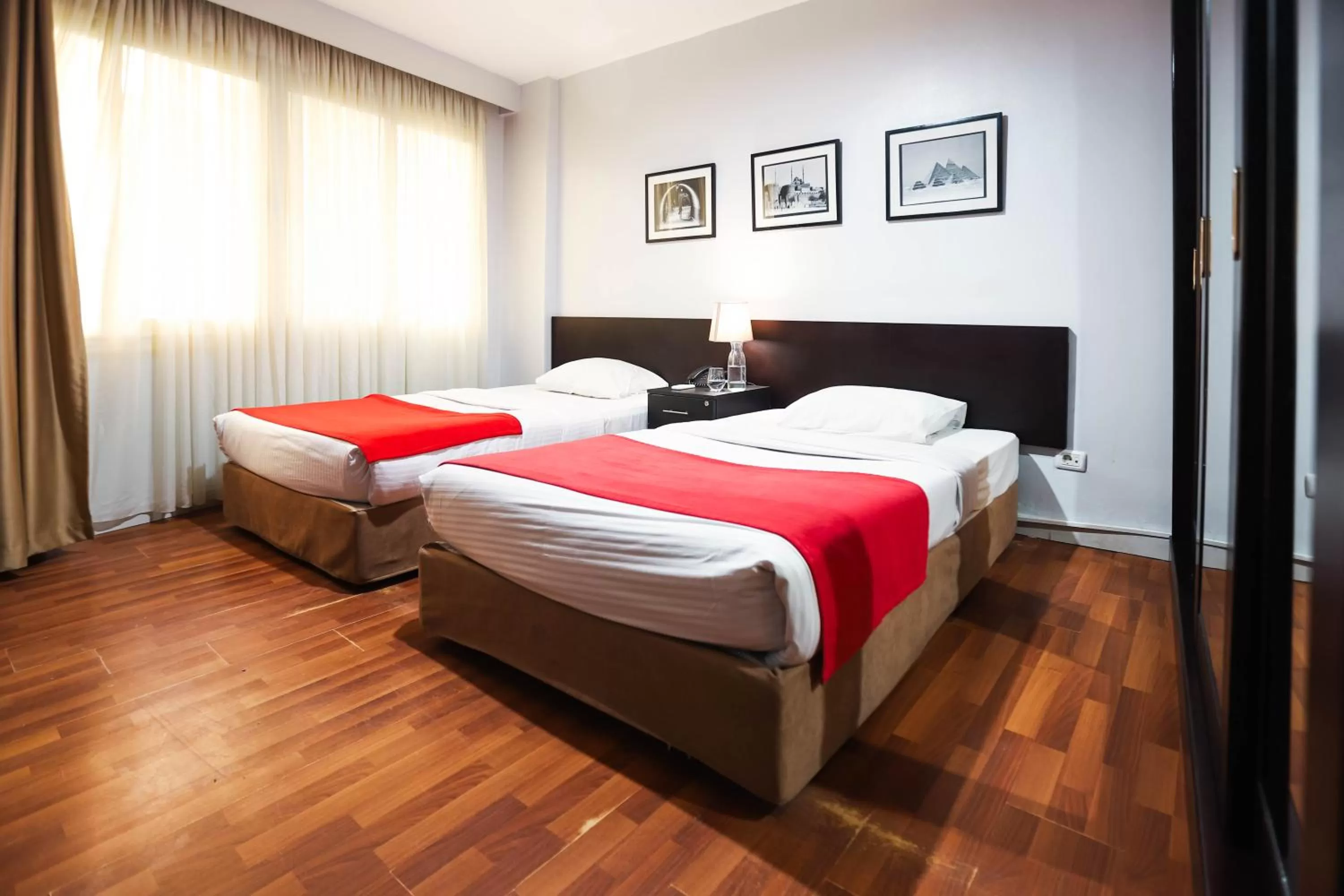 Bedroom, Bed in NewCity Hotel & Suites