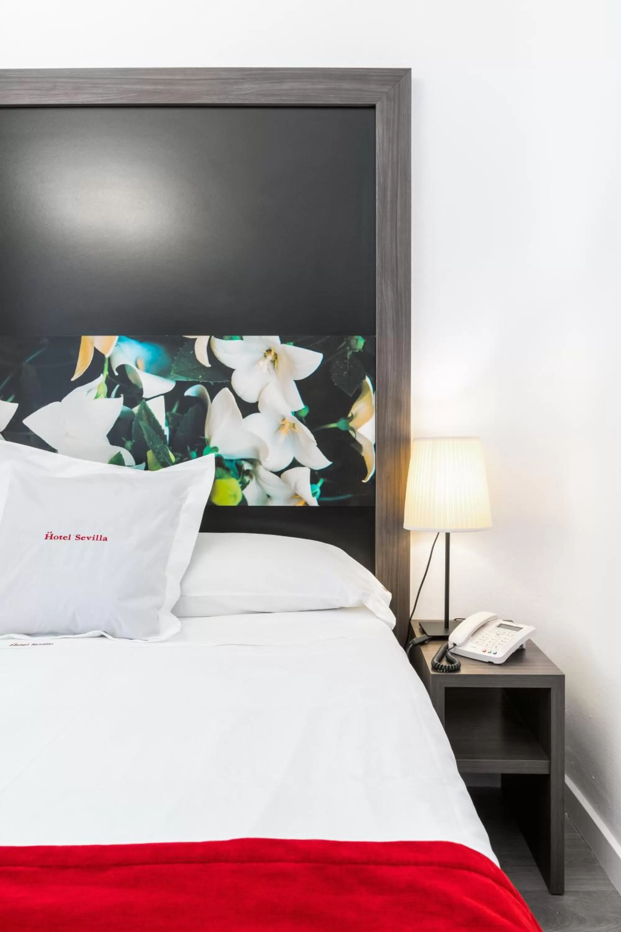 Bed in Hotel Sevilla