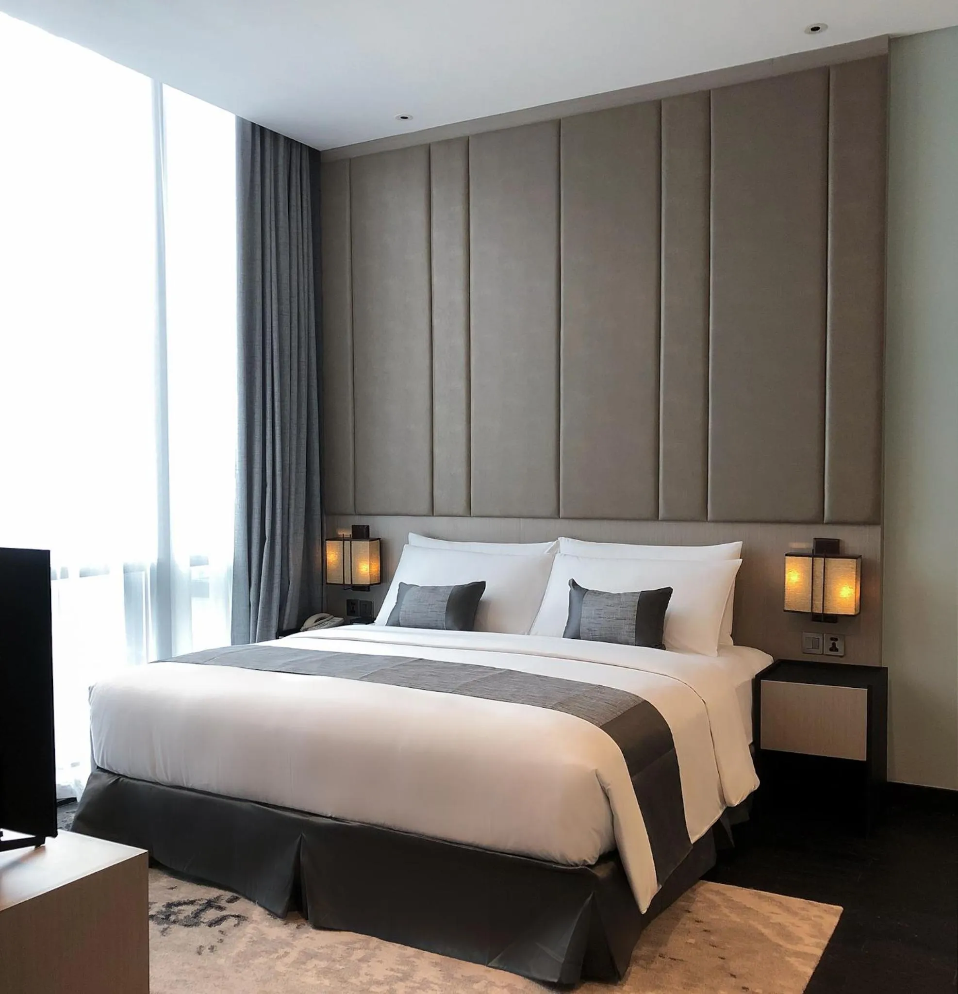 Bedroom, Bed in Crowne Plaza Jakarta Residences, an IHG Hotel