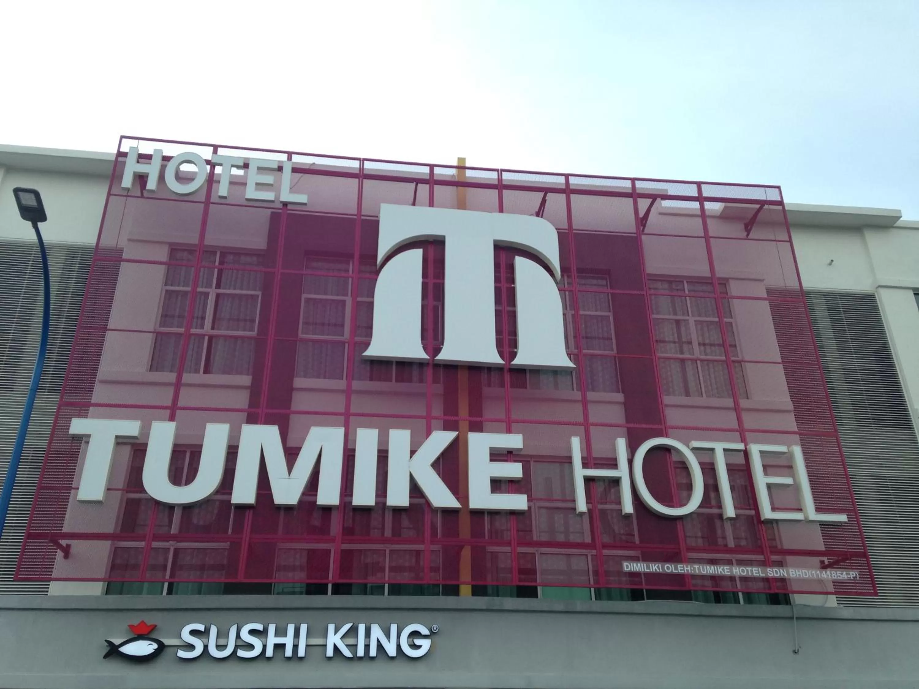 Property logo or sign in Tumike Hotel Bentong