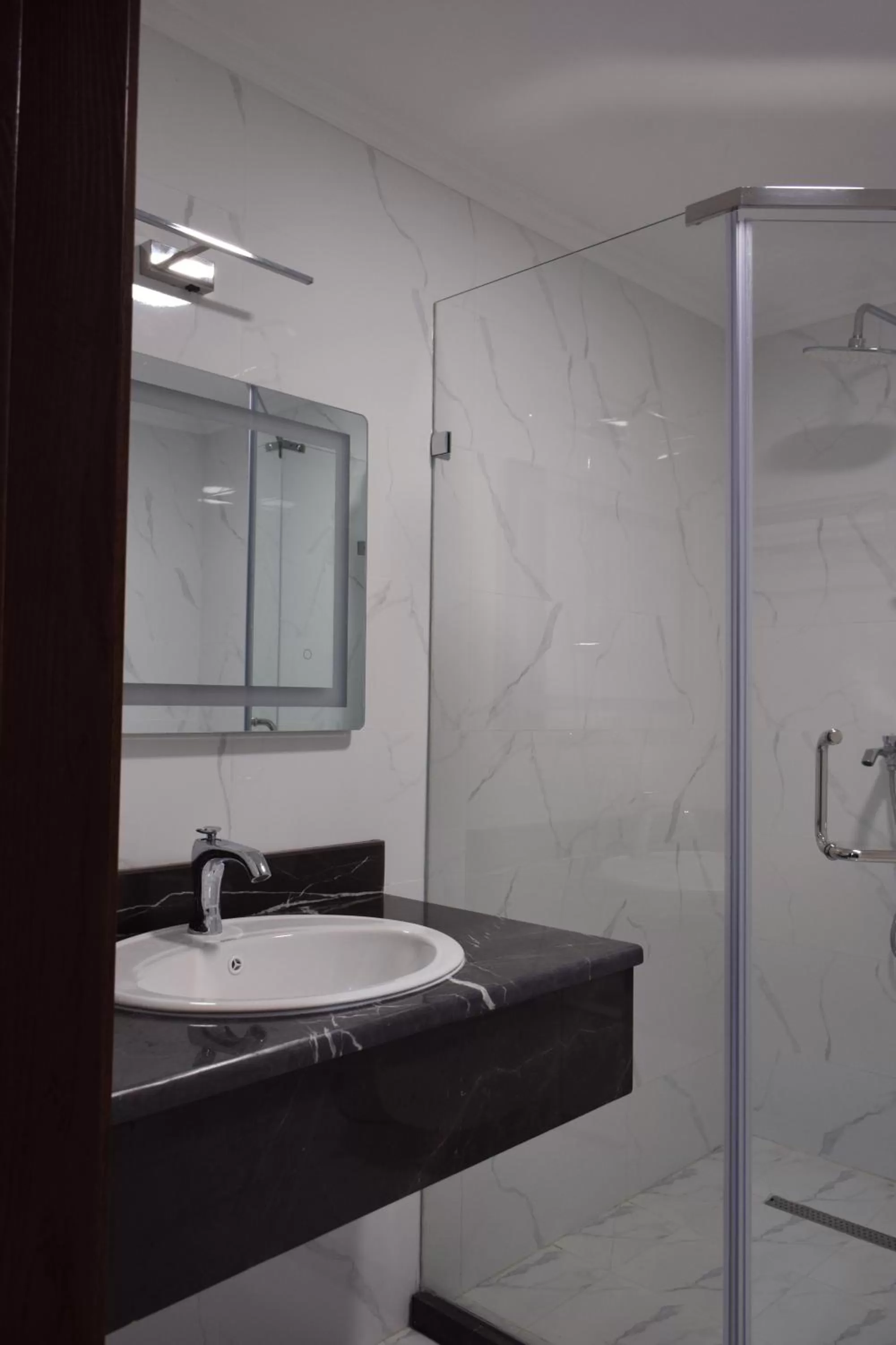 Shower in MirOtel Hotel