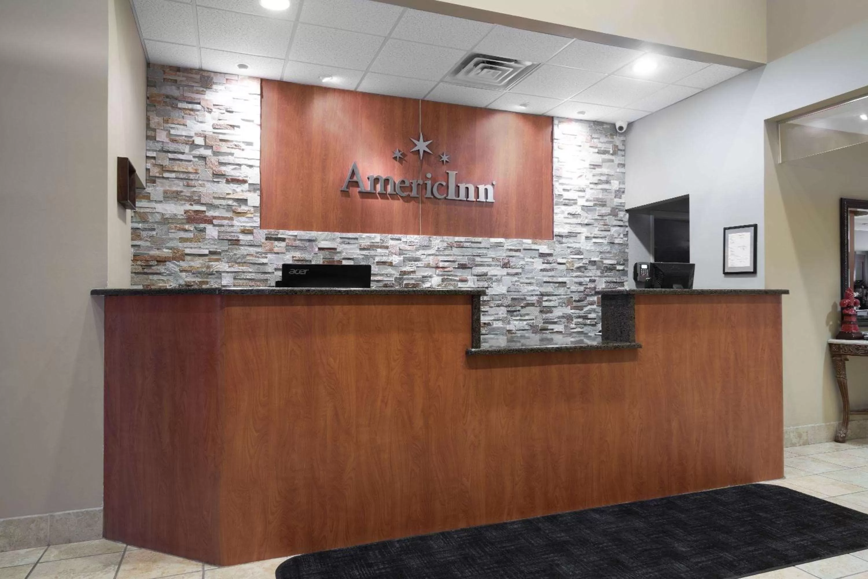 Lobby or reception in AmericInn by Wyndham Rochester