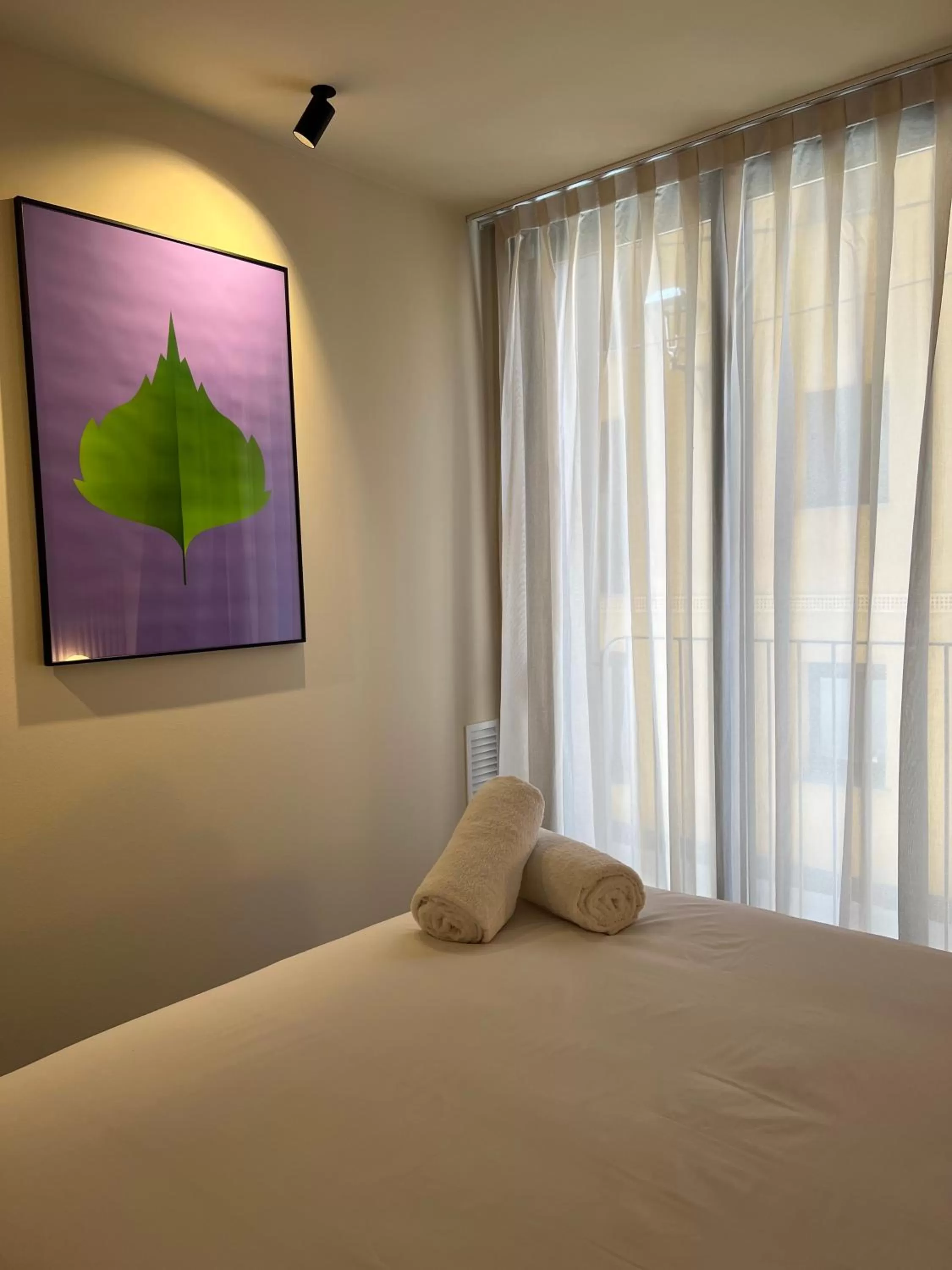 Bed in CIM HOTEL BOUTIQUE