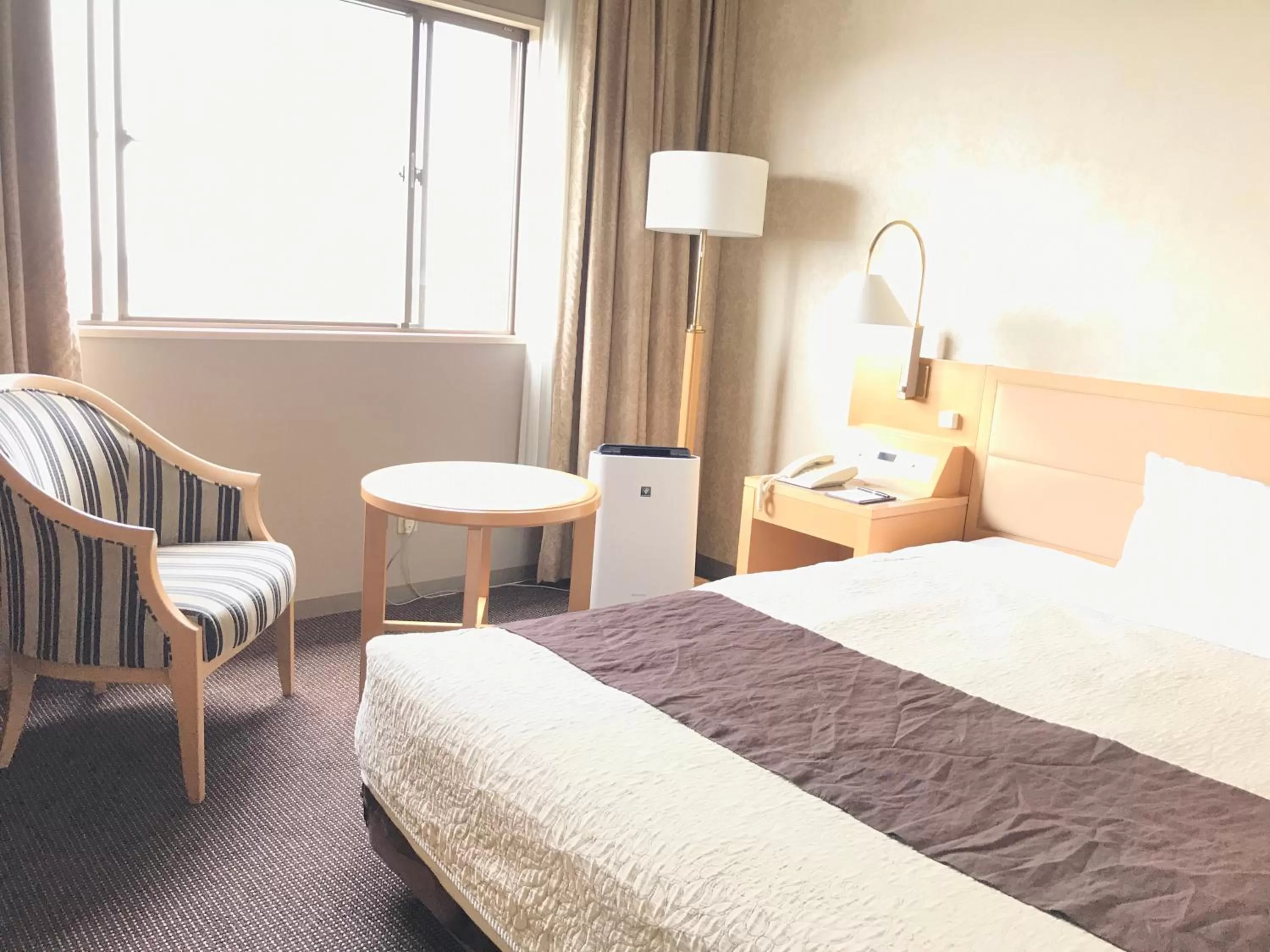 Bed in Numazu River Side Hotel