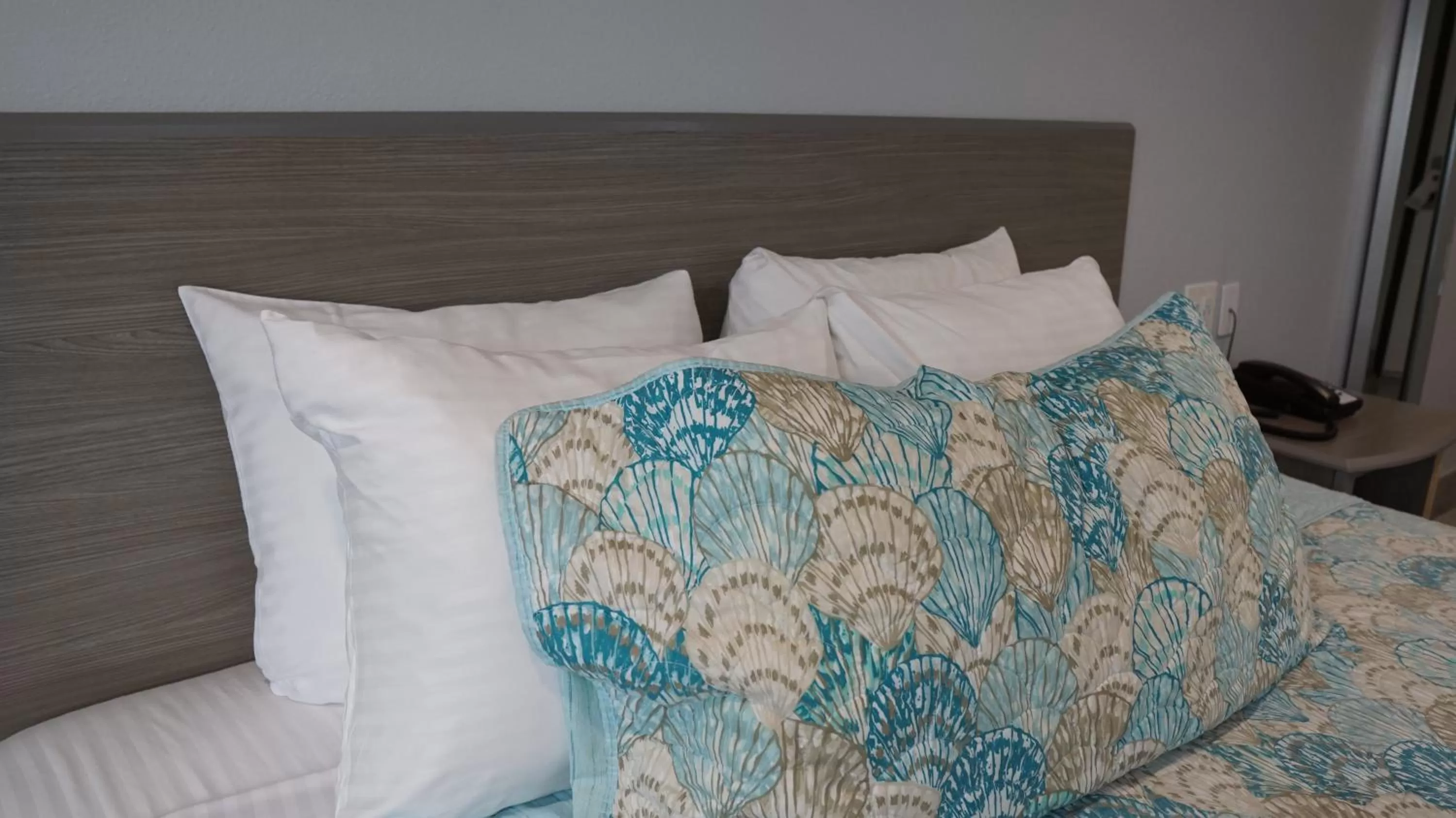 Bed in Surf City Inn