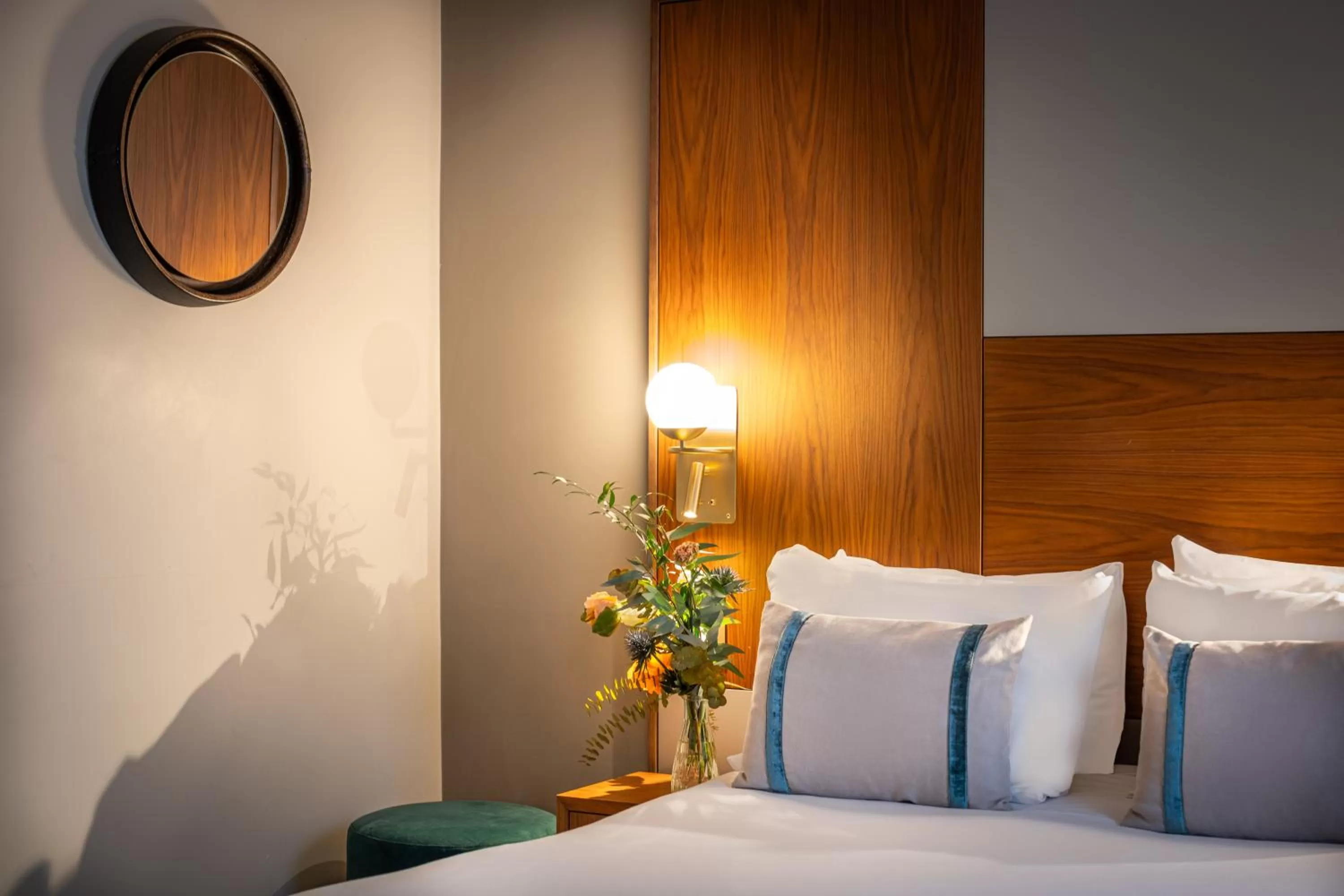 Decorative detail, Bed in Hôtel Le Tourville by Inwood Hotels