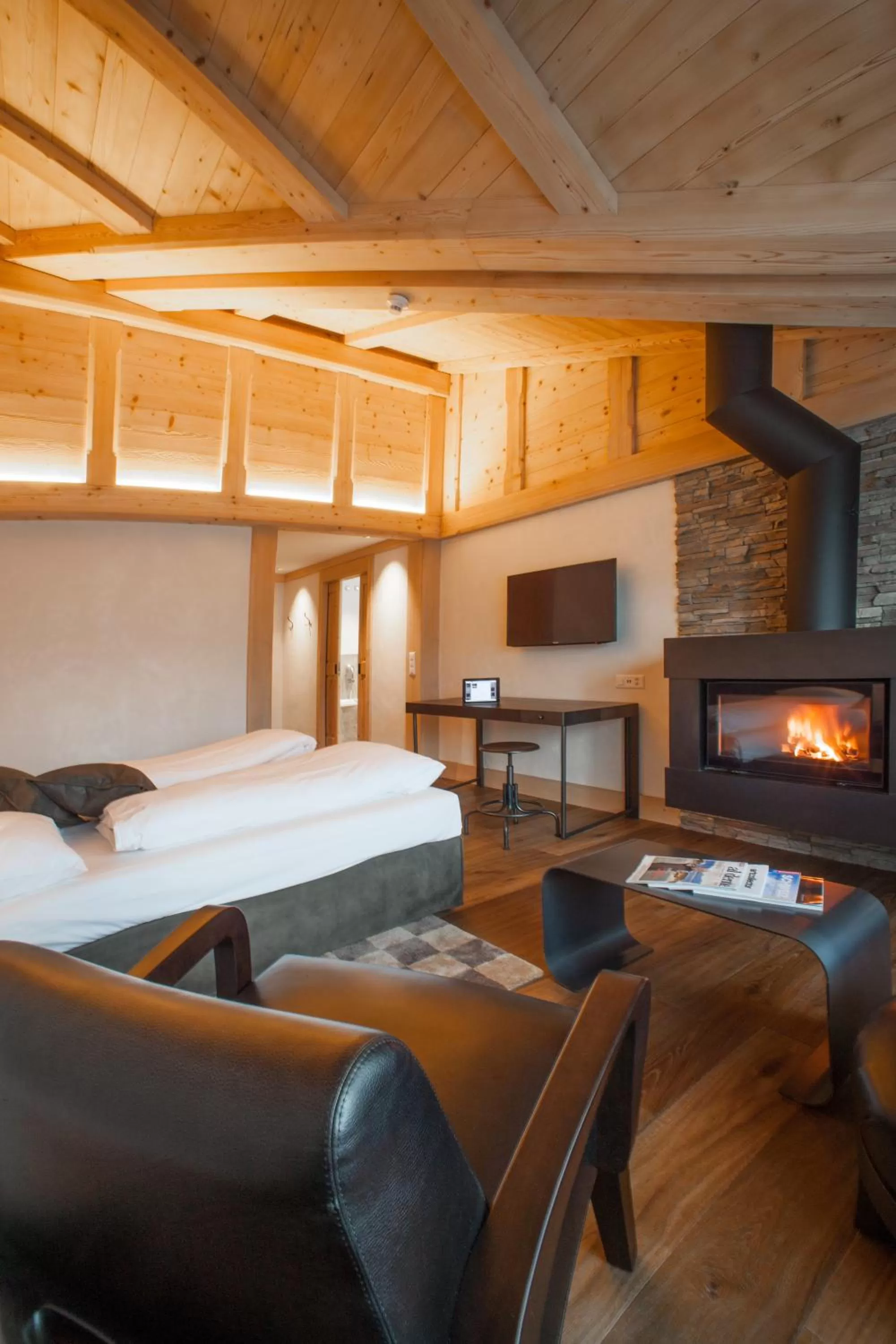 Photo of the whole room, Bed in Bernerhof Swiss Quality Hotel Gstaad