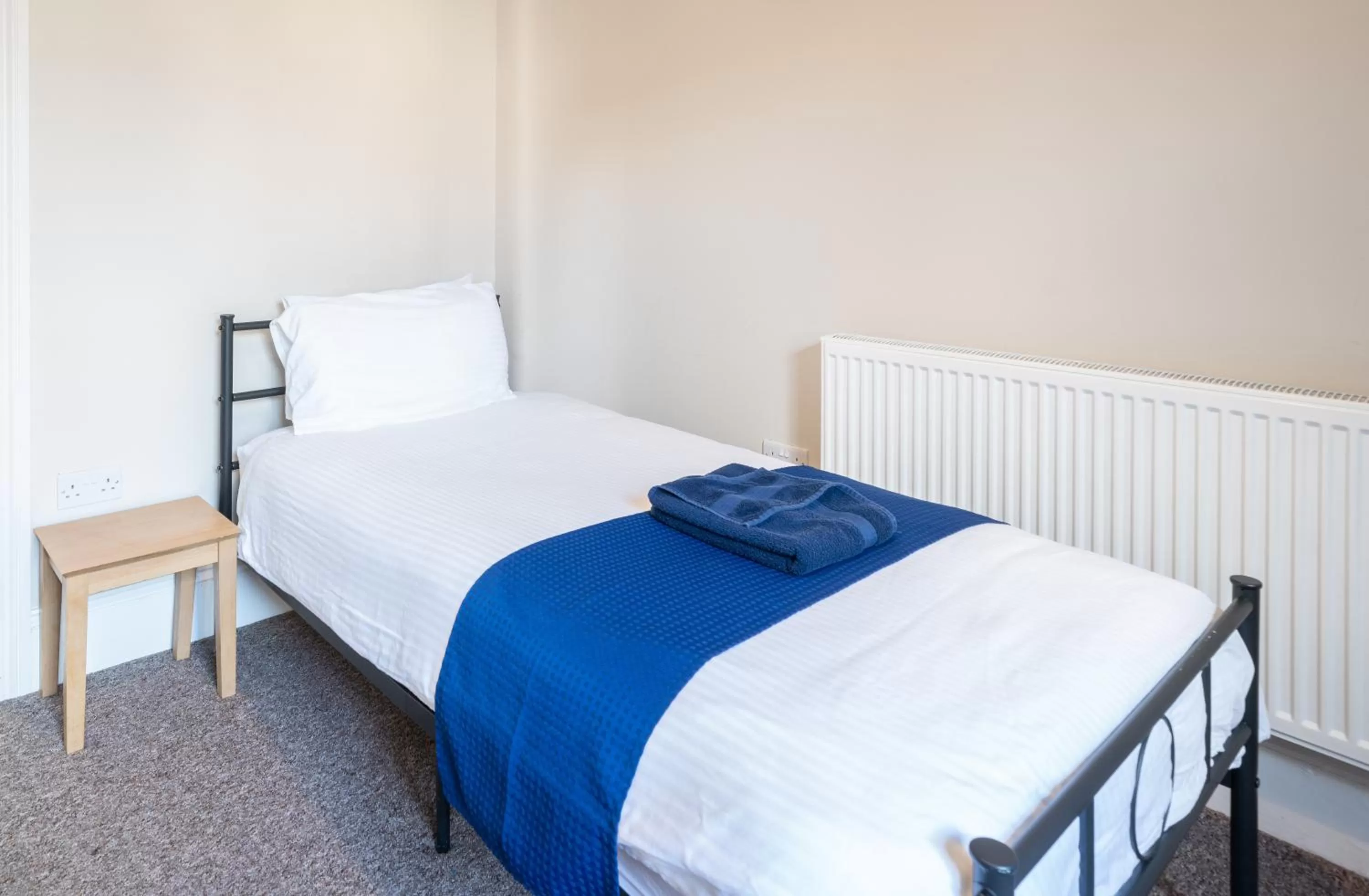 Bed in The Veteran Hotel & Bar