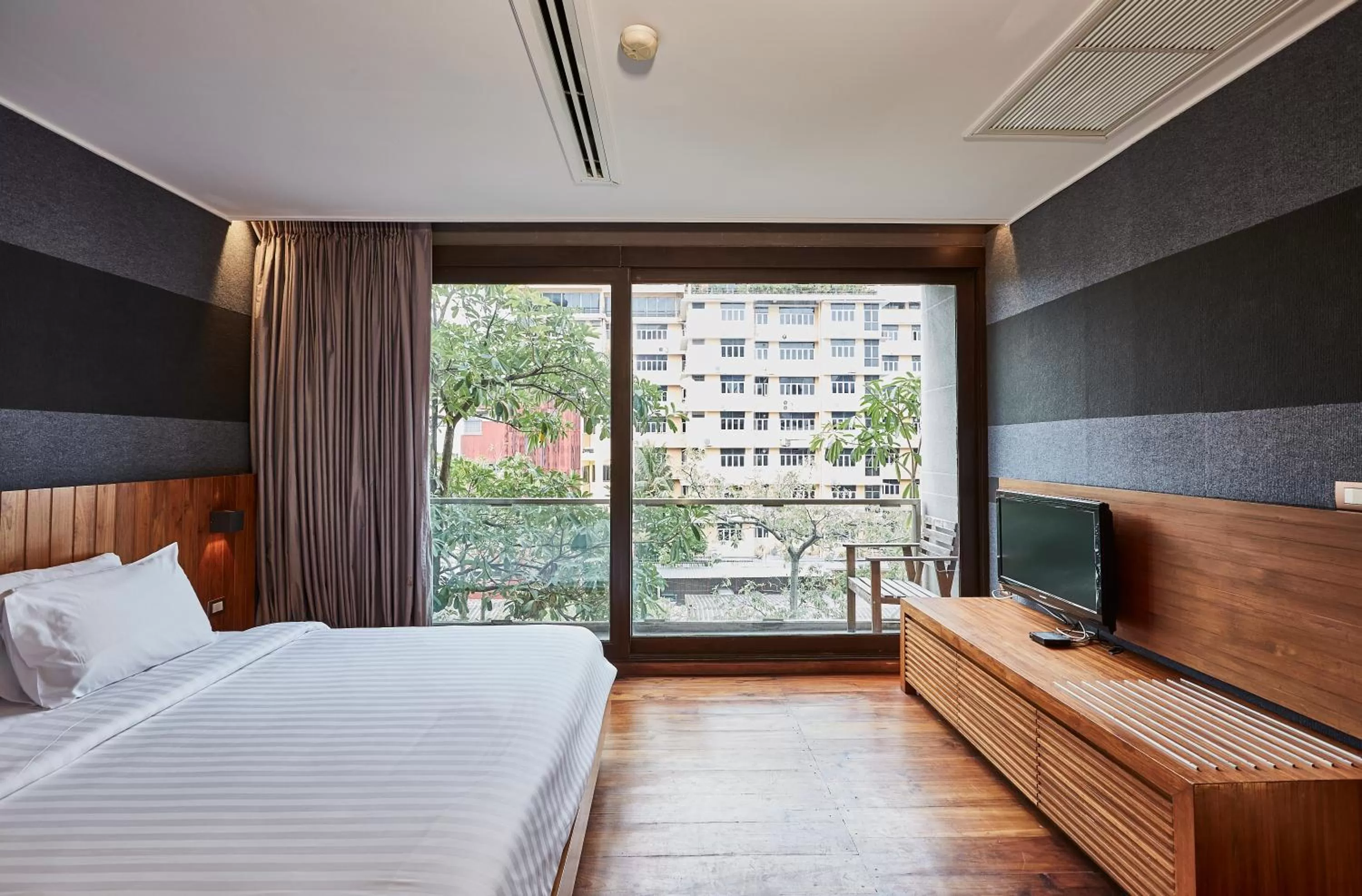 Bed in LUXX Langsuan Hotel - SHA Plus