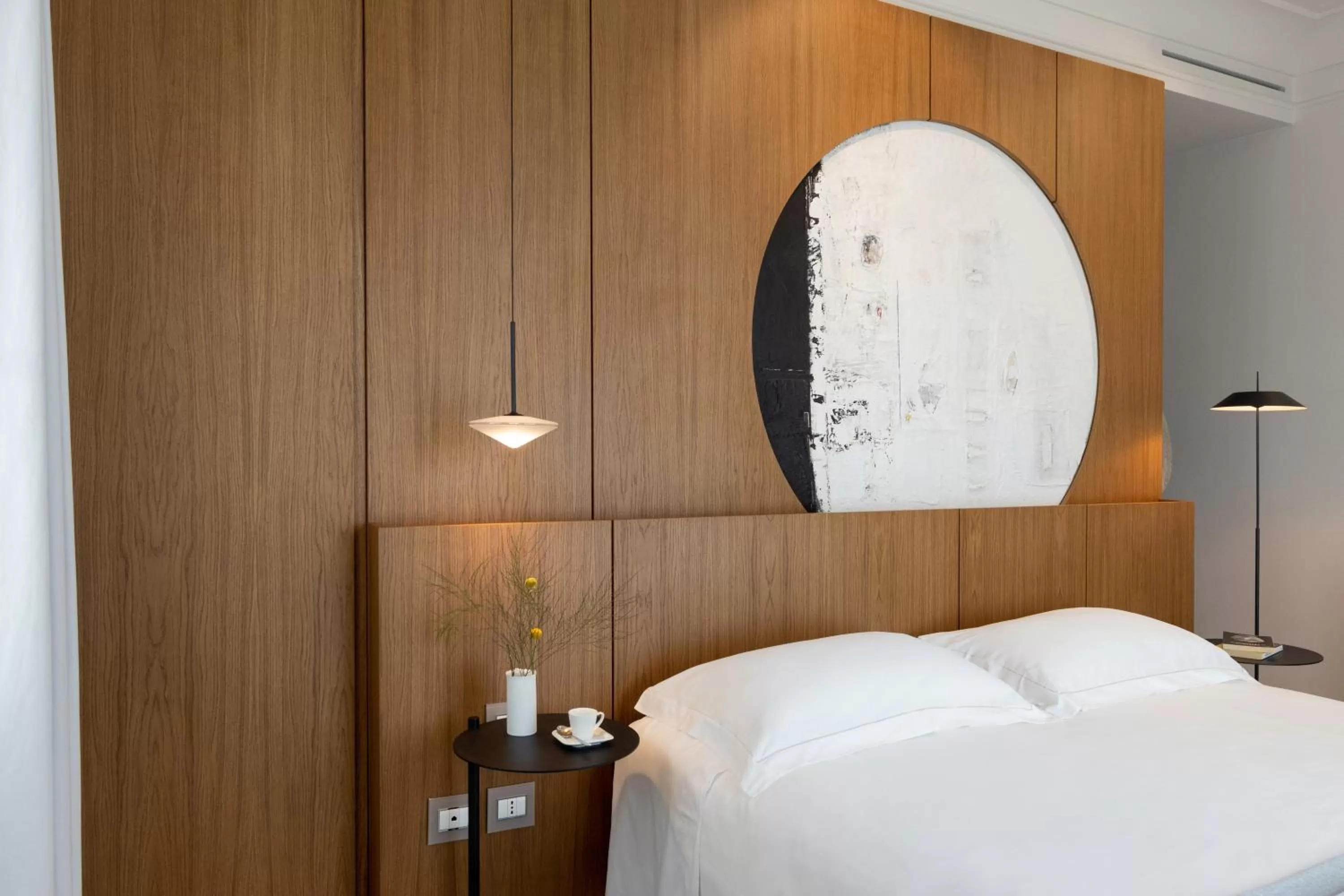 Bed in Taodomus Boutique Hotel