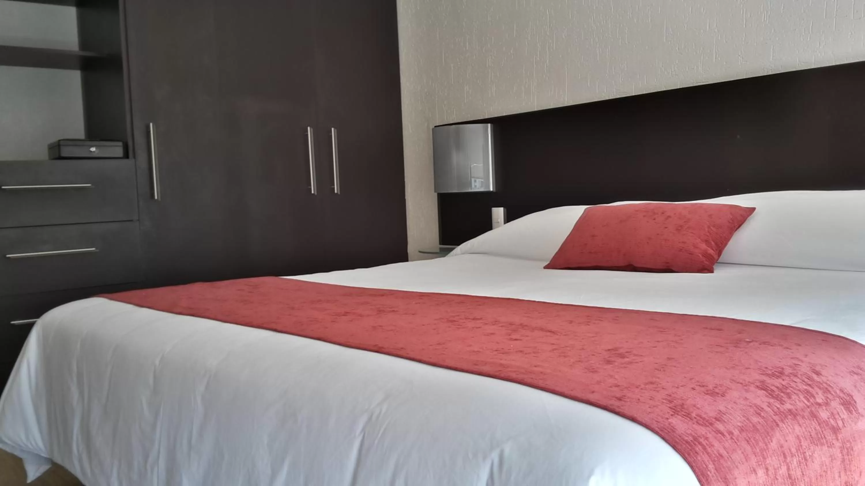 Bed in Grupo Kings Suites -Monte Chimborazo 537
