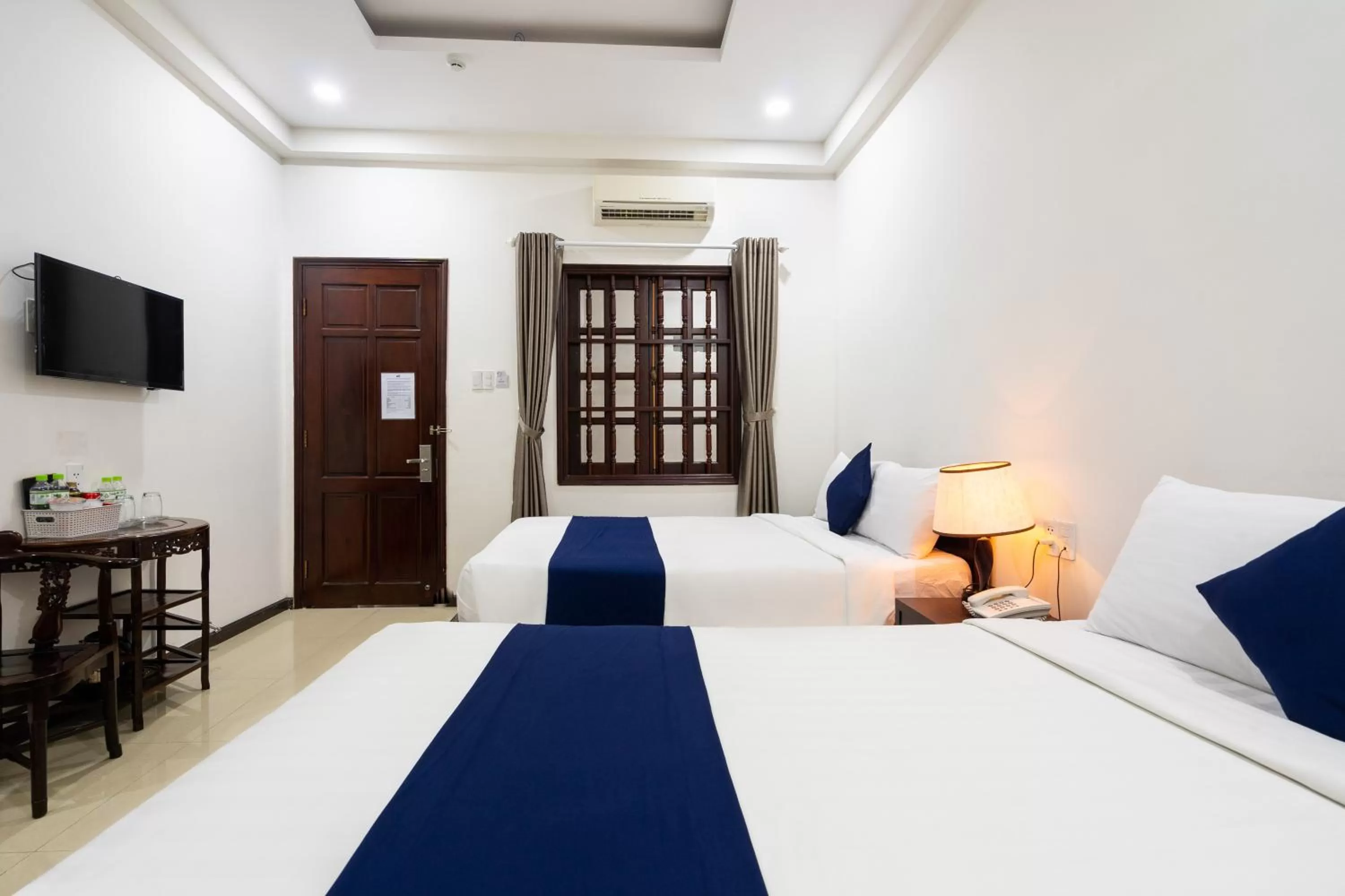 Bed in Central Hotel by Joi Hospitality