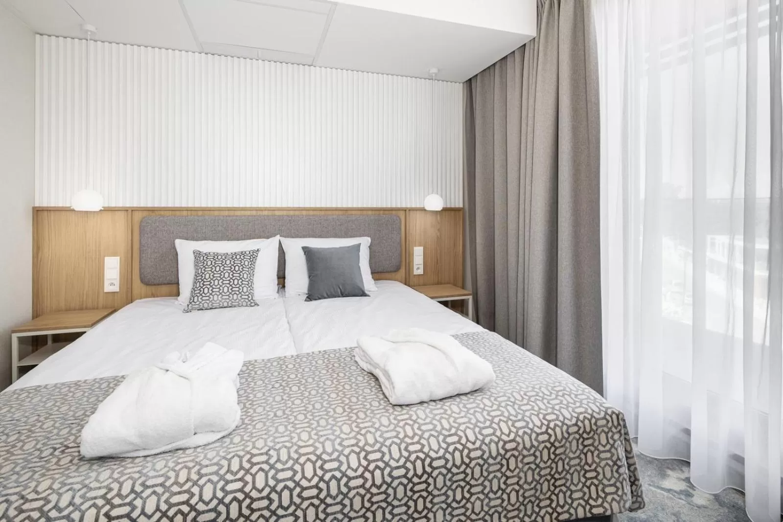 Bed in Maloves Resort & Spa