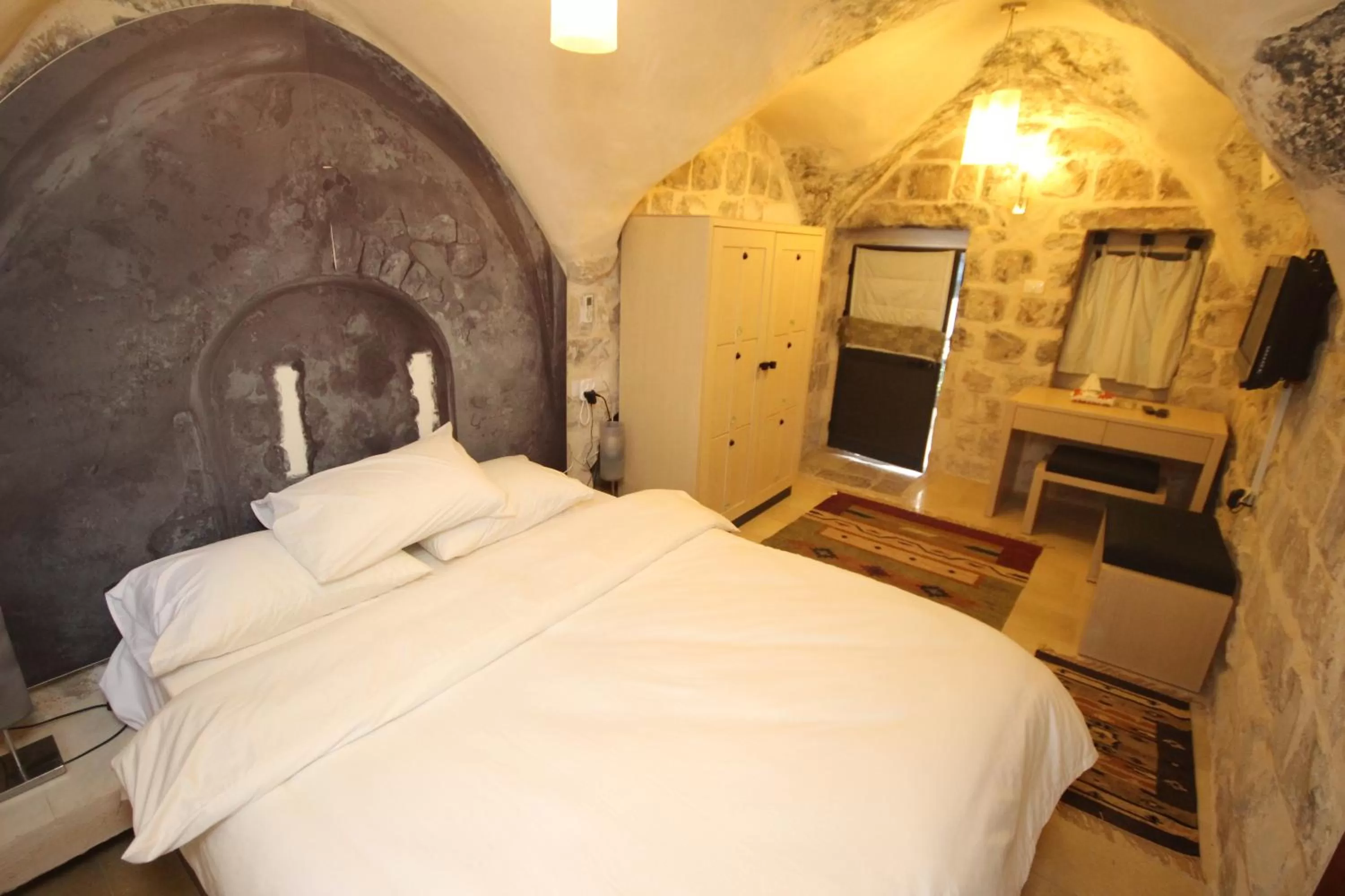 Bed in Khan Alwakala Hotel