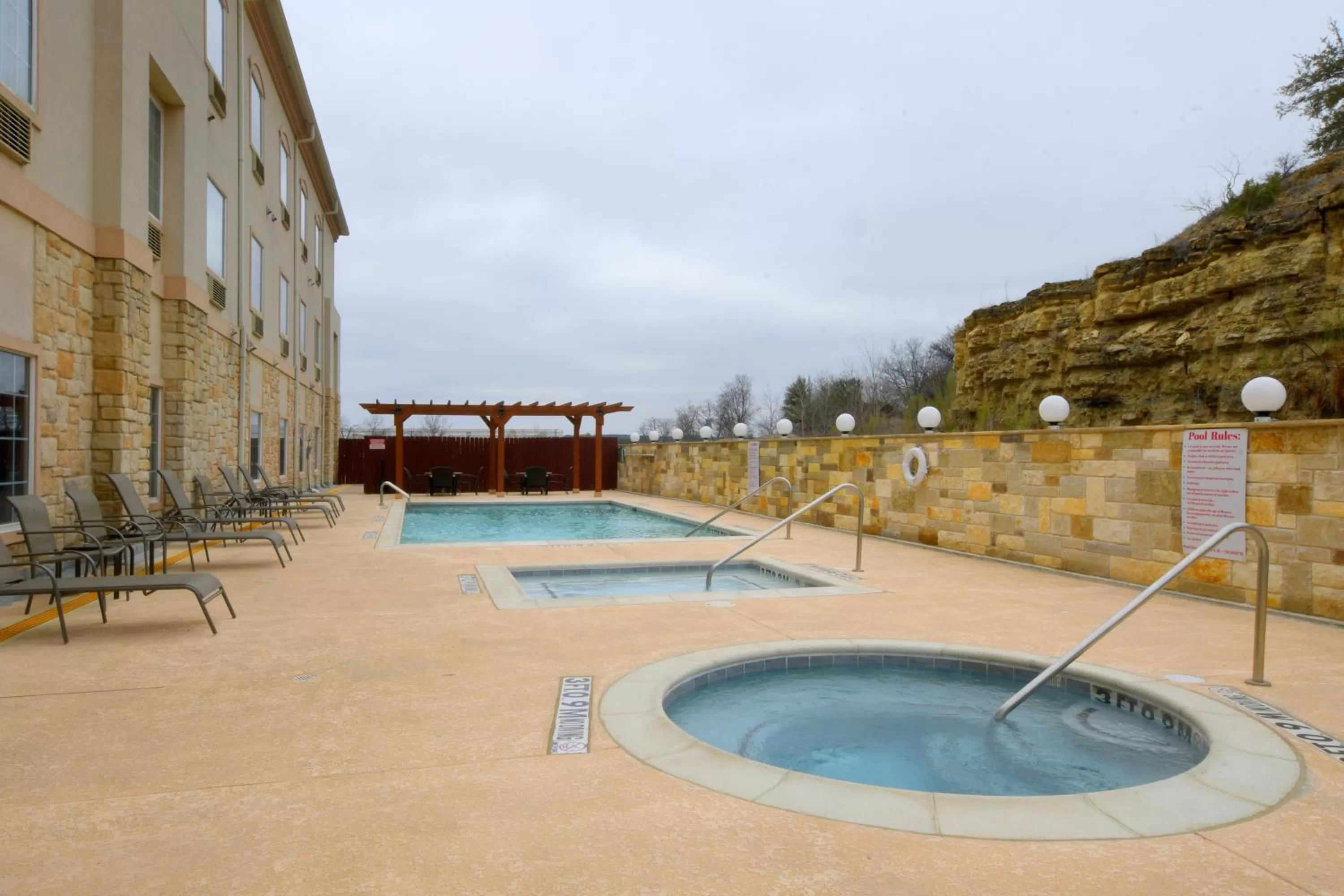 Swimming pool in Baymont Inn & Suites by Wyndham Glen Rose
