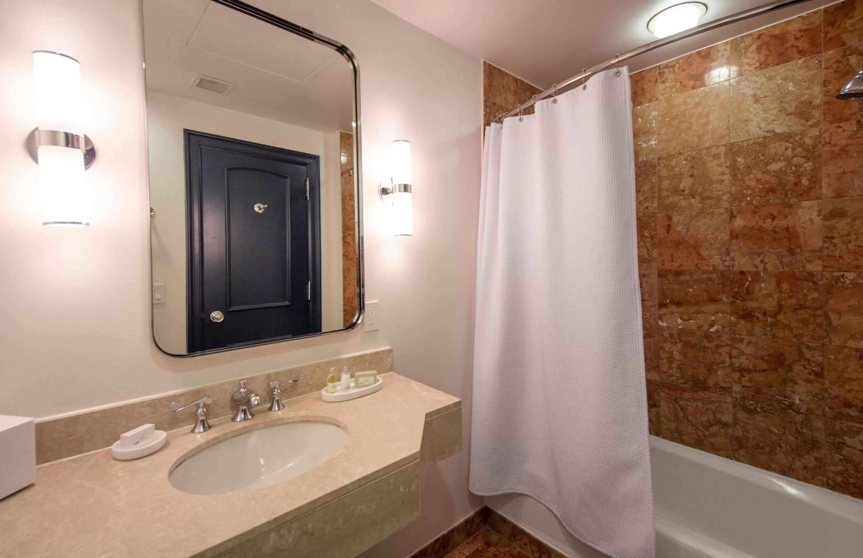 Bathroom in Hotel Theo New Orleans, Tapestry Collection by Hilton