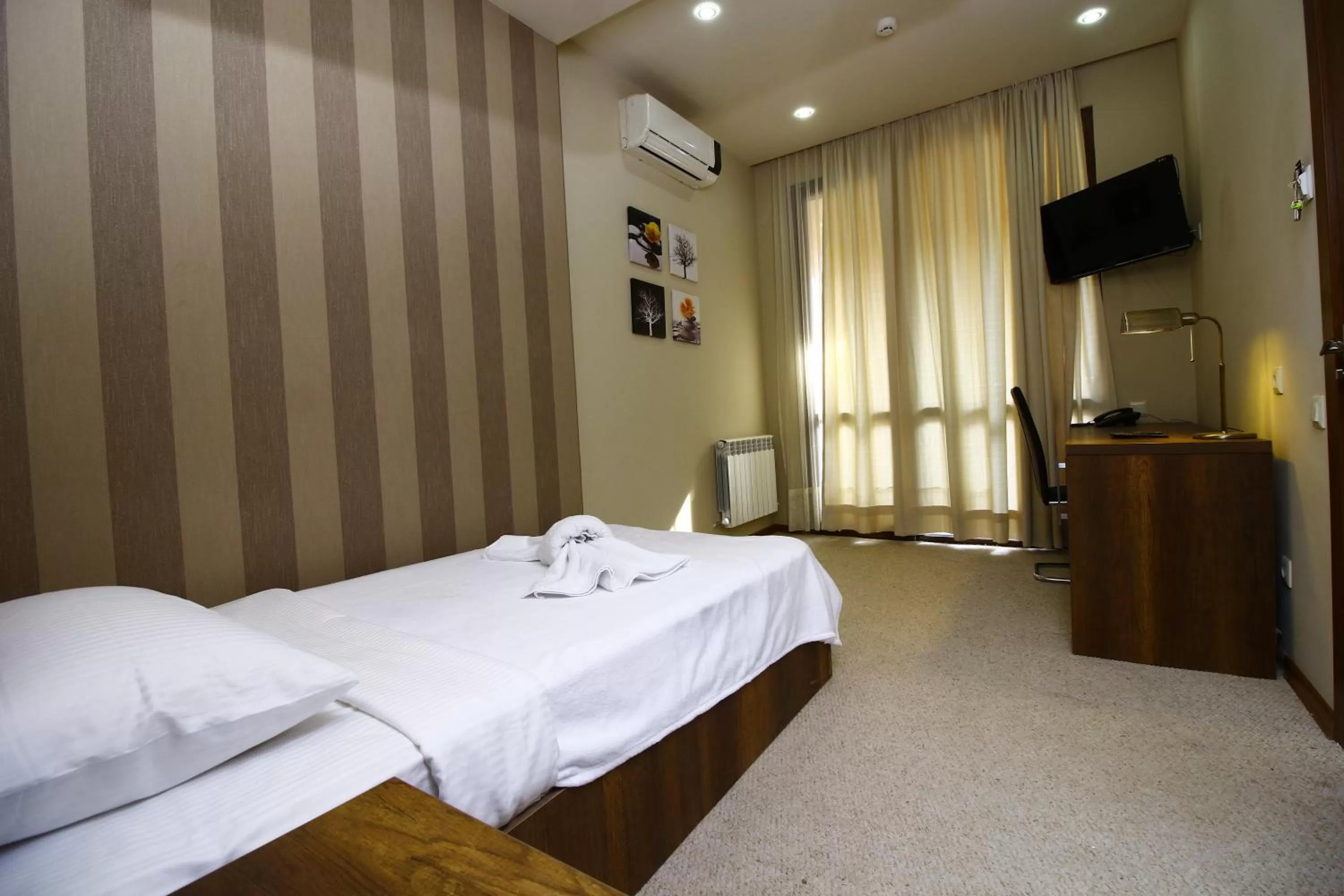 Photo of the whole room, Bed in Sani Hotel