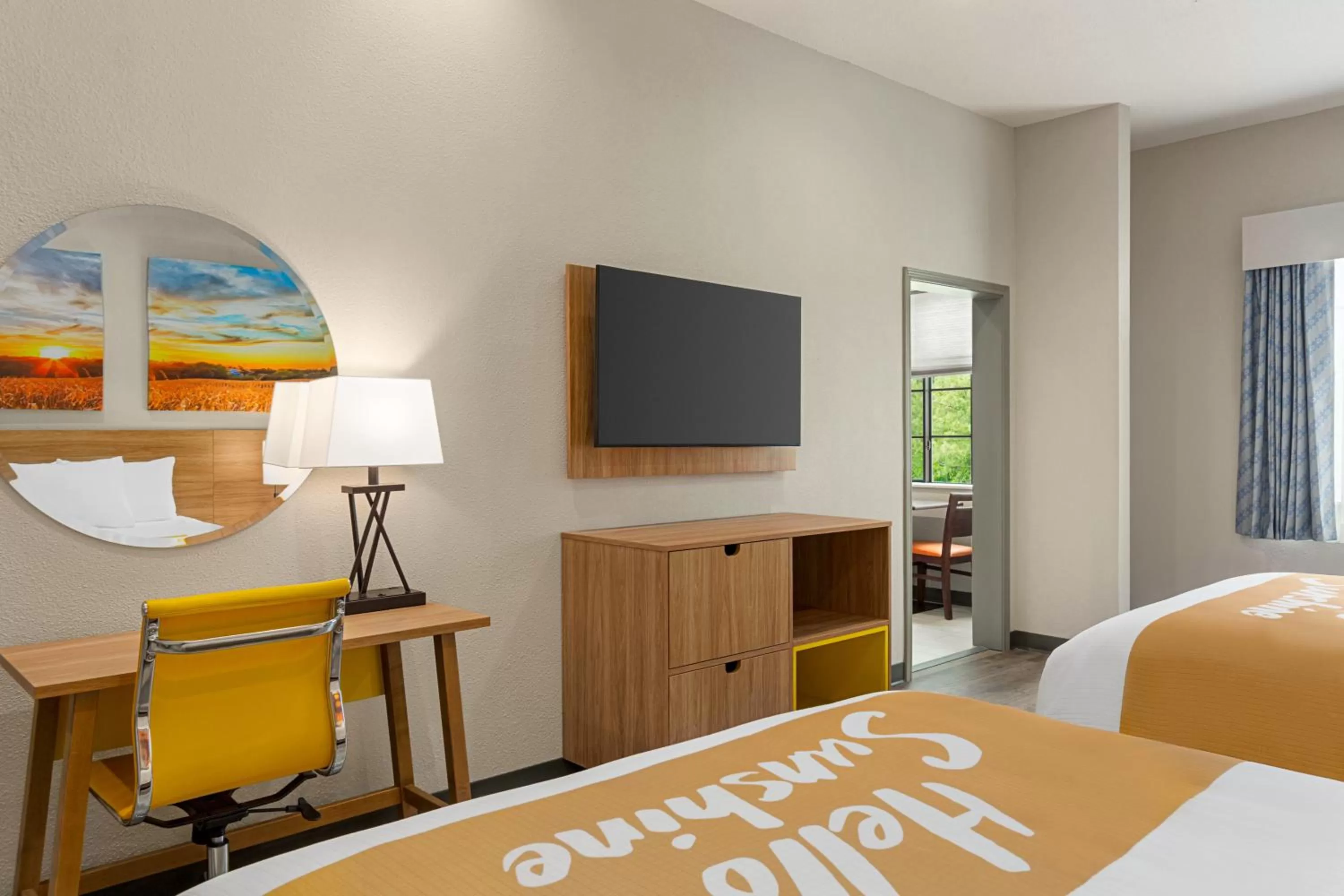 TV and multimedia, Bed in Days Inn & Suites by Wyndham Greater Tomball