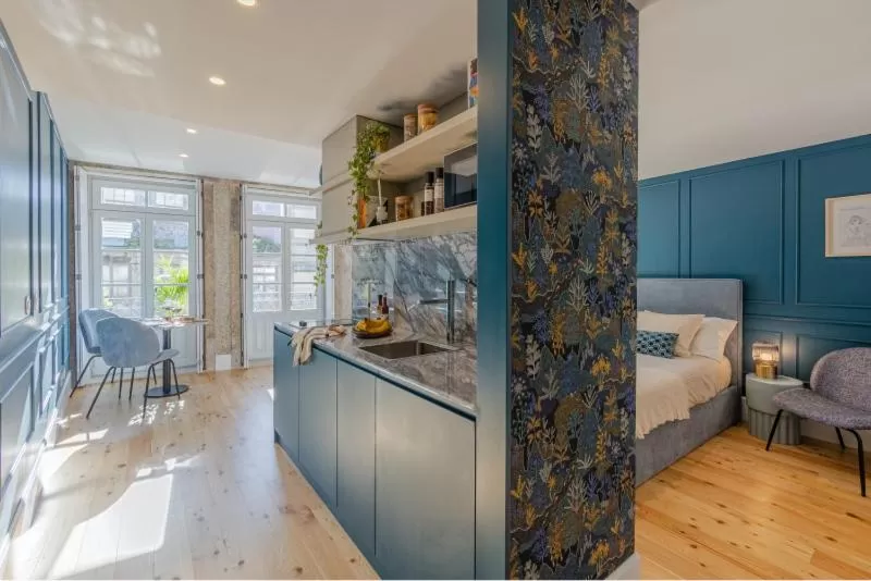 Kitchen or kitchenette, Bed in As Vizinhas Boutique Apartments