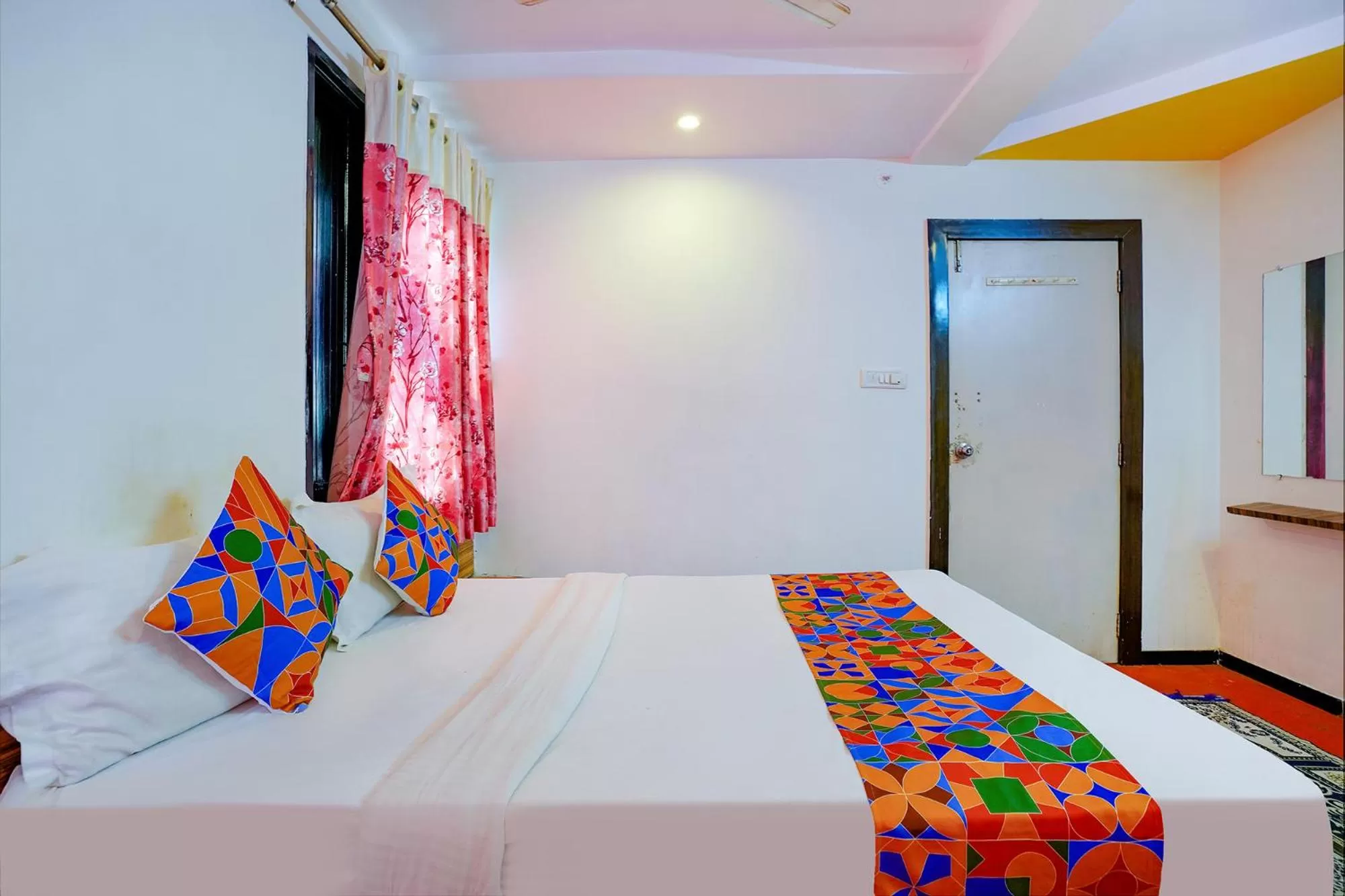 Bed in FabHotel Sai Chatra