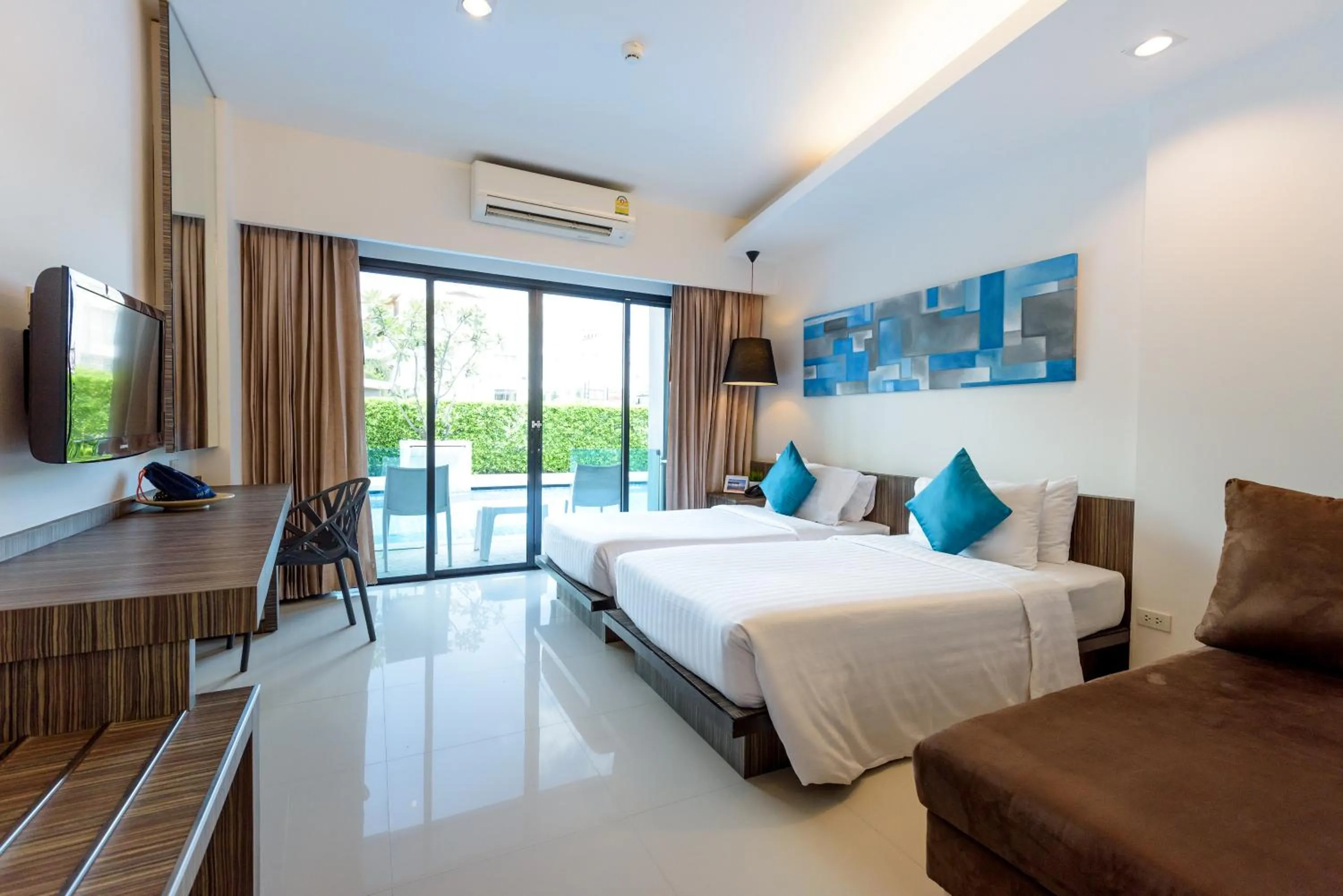 Bed in Hotel J Residence Pattaya
