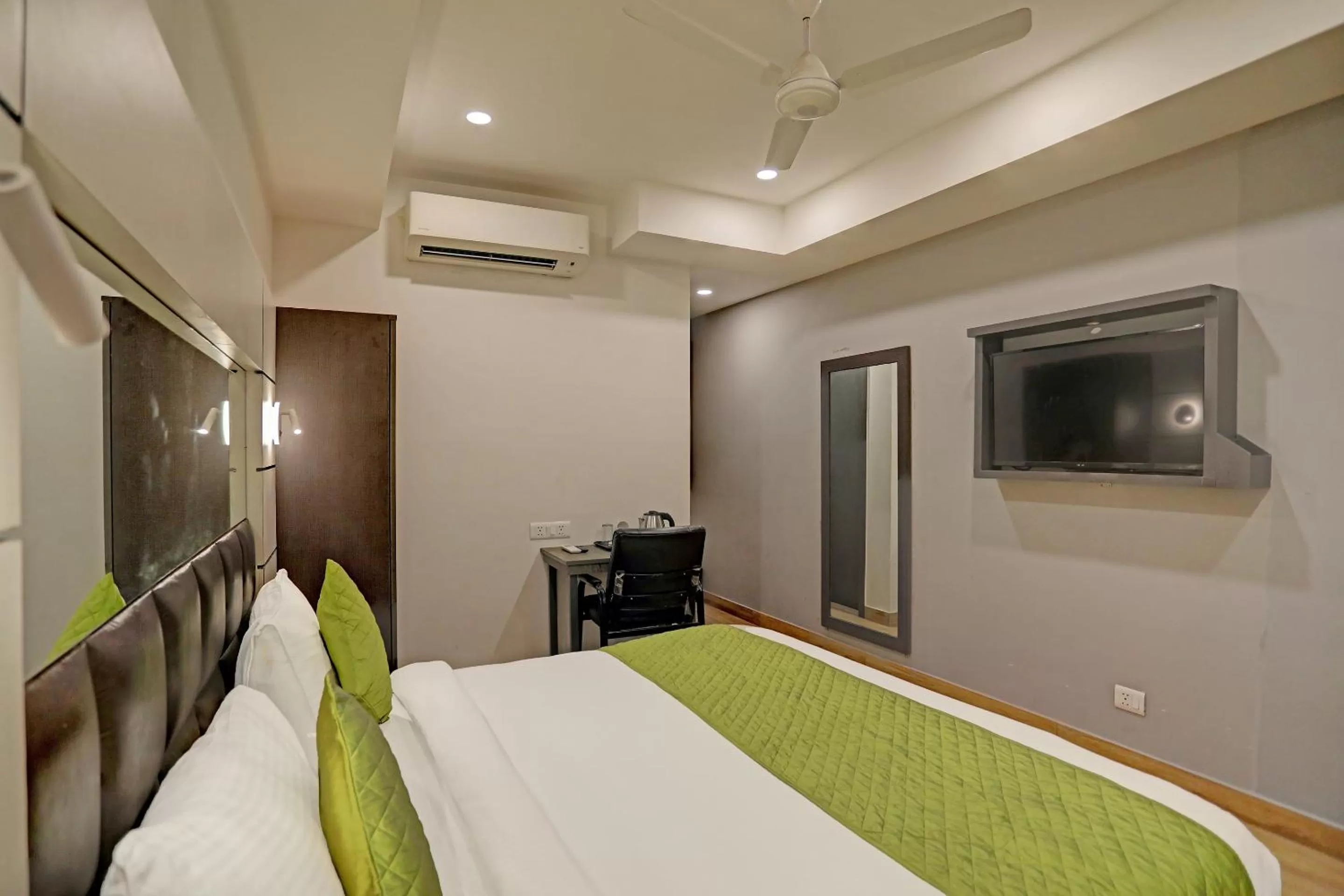 Bed in Hotel Royal Saffron By F9 Hotels