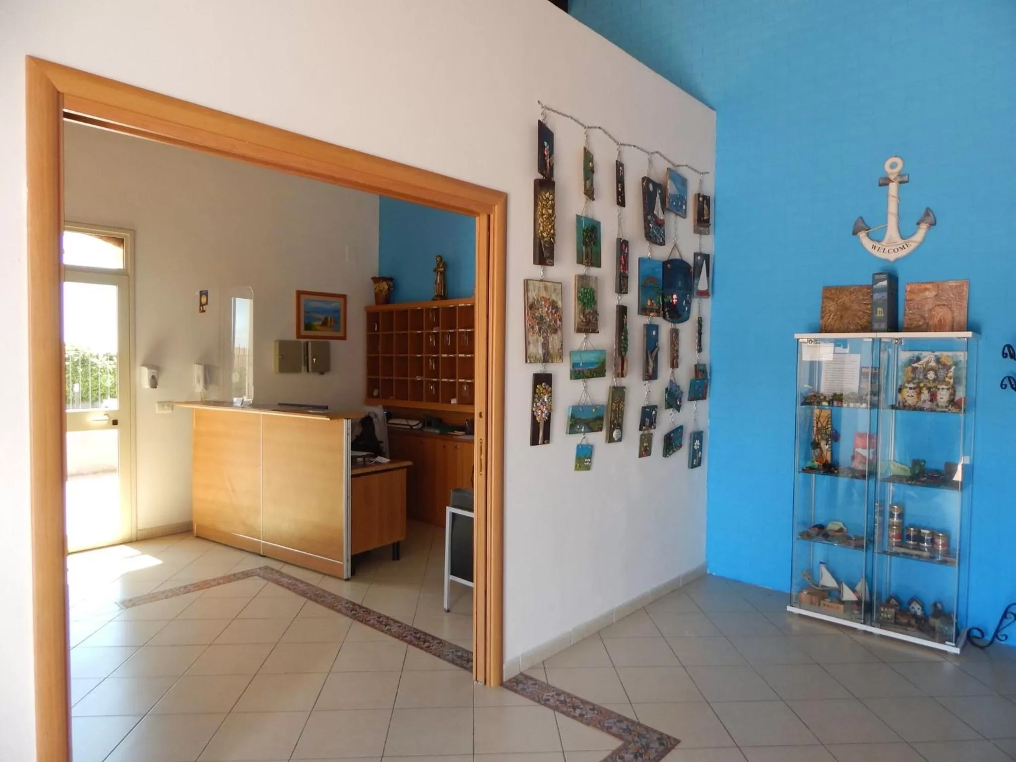 Lobby or reception, Kitchen/Kitchenette in Case Vacanze Ancora