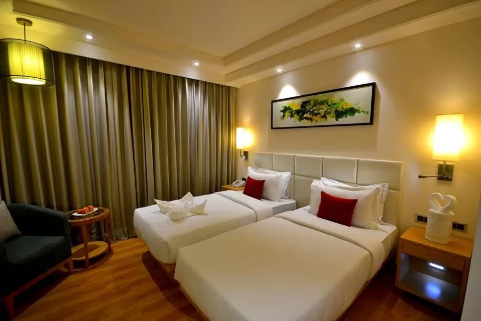 Bed in Pearltree Hotels And Resorts