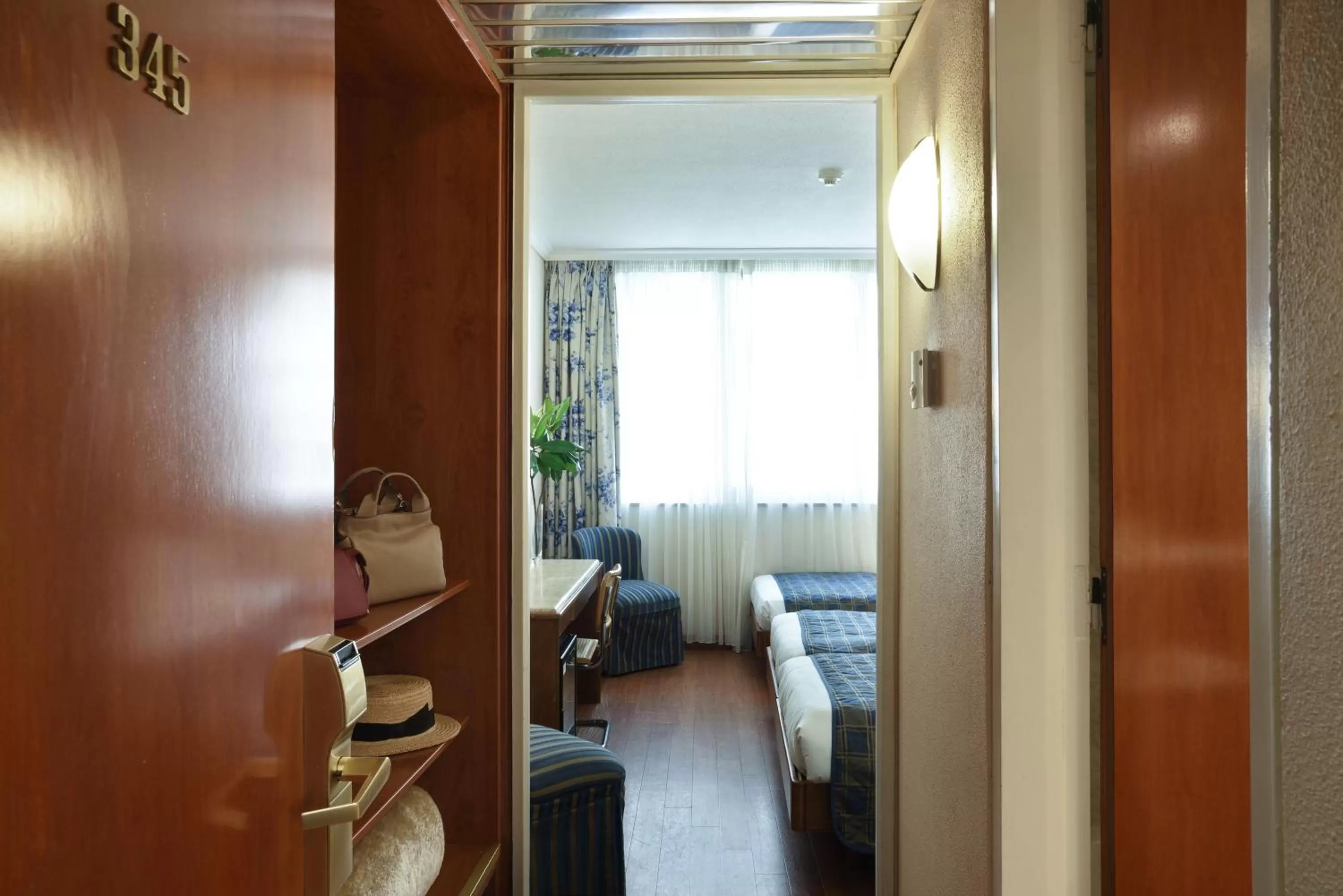 Bed in Titania Hotel