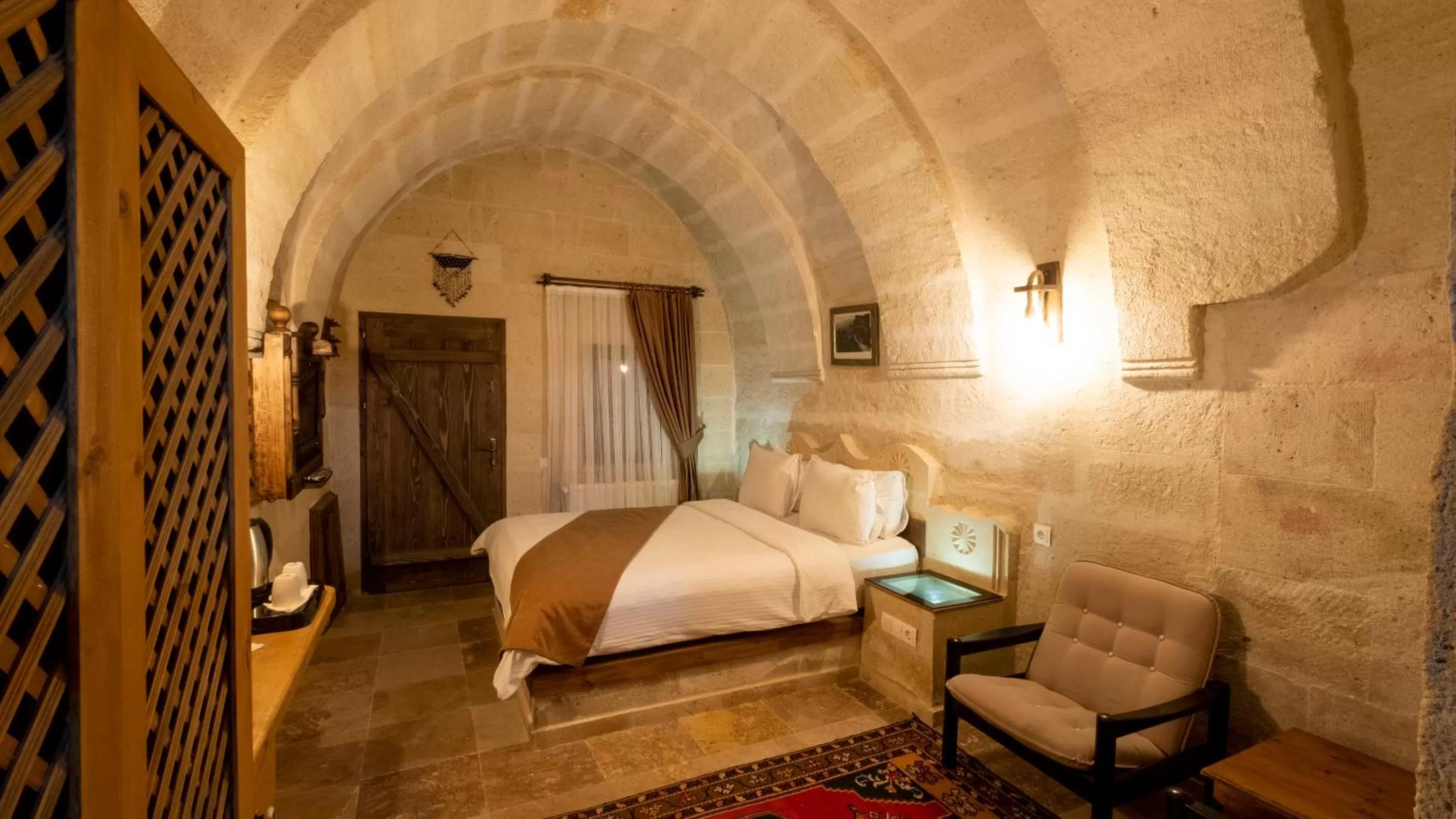 Photo of the whole room, Bed in In Stone House