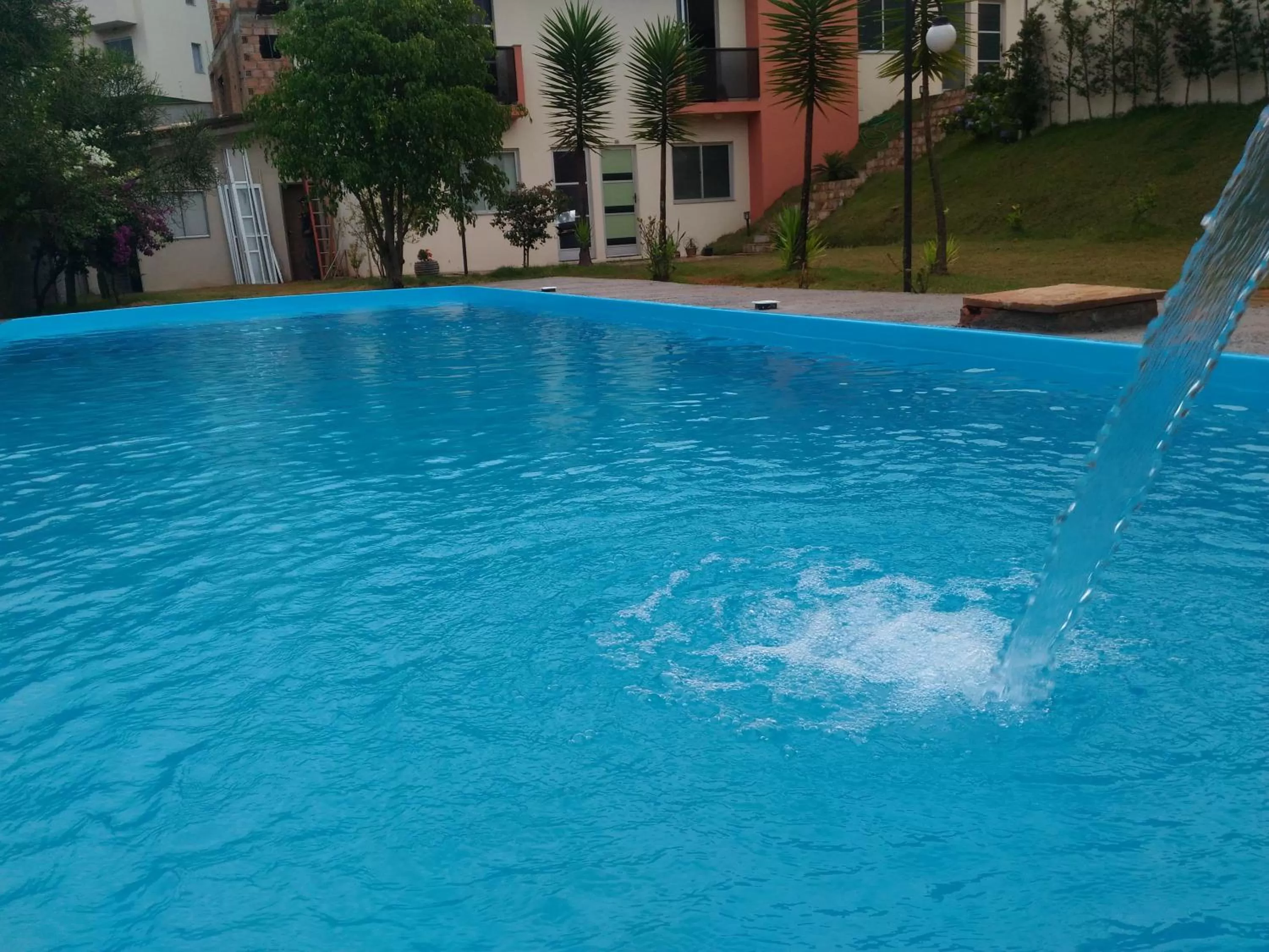 Swimming pool in Pousada Vila Real Flats