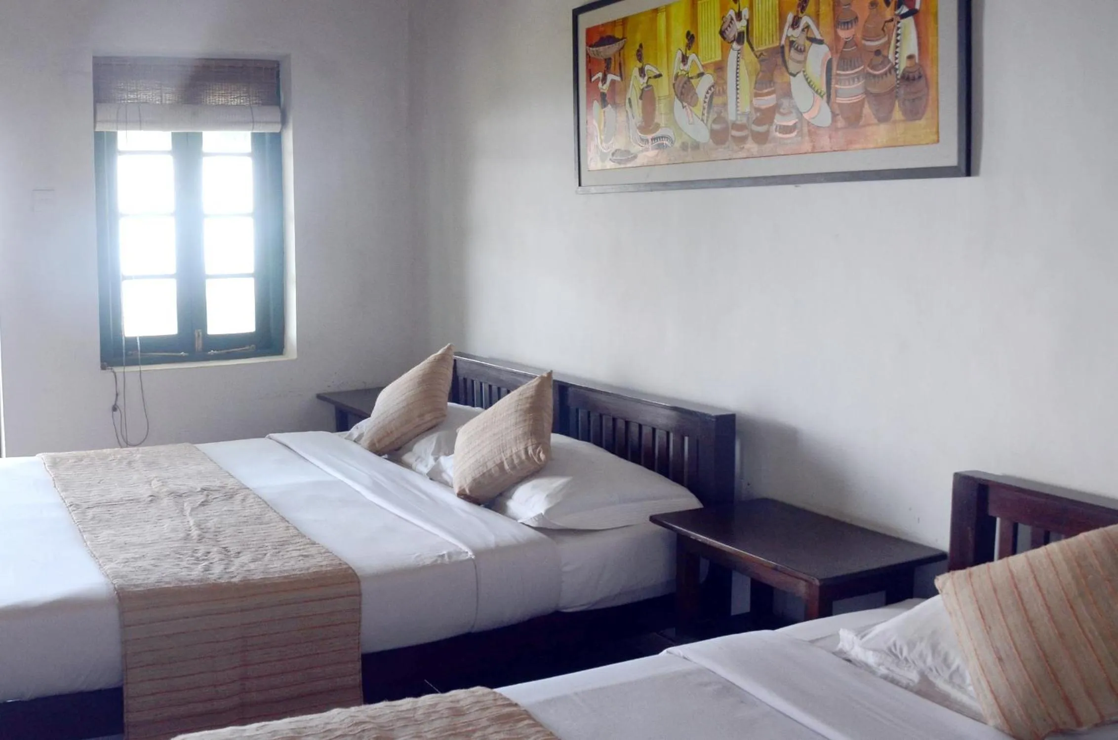 Bed in Sir John's Bungalow