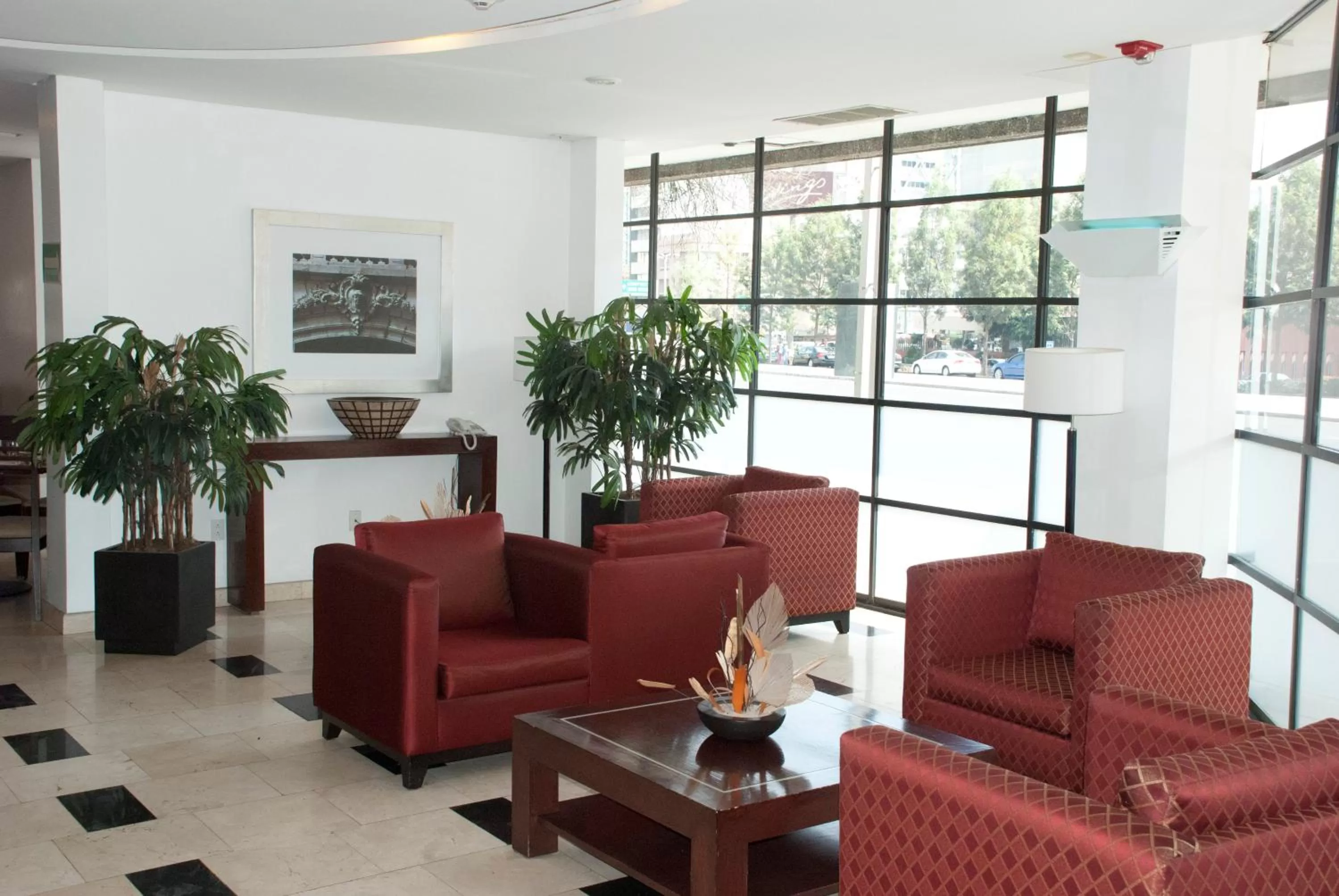 Lobby or reception in Hotel & Suites PF