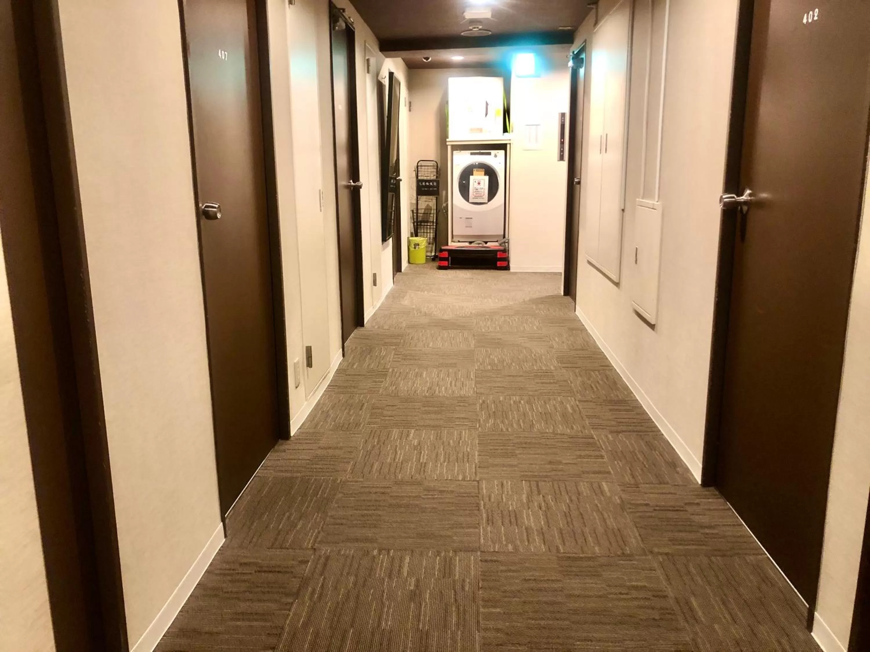 washing machine in Pod Select Hotel Shinjuku