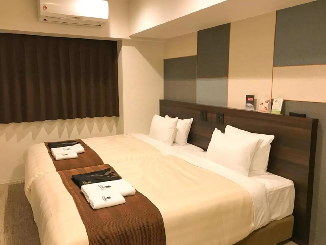 Photo of the whole room, Bed in HOTEL LiVEMAX PREMIUM Sapporo Odorikoen