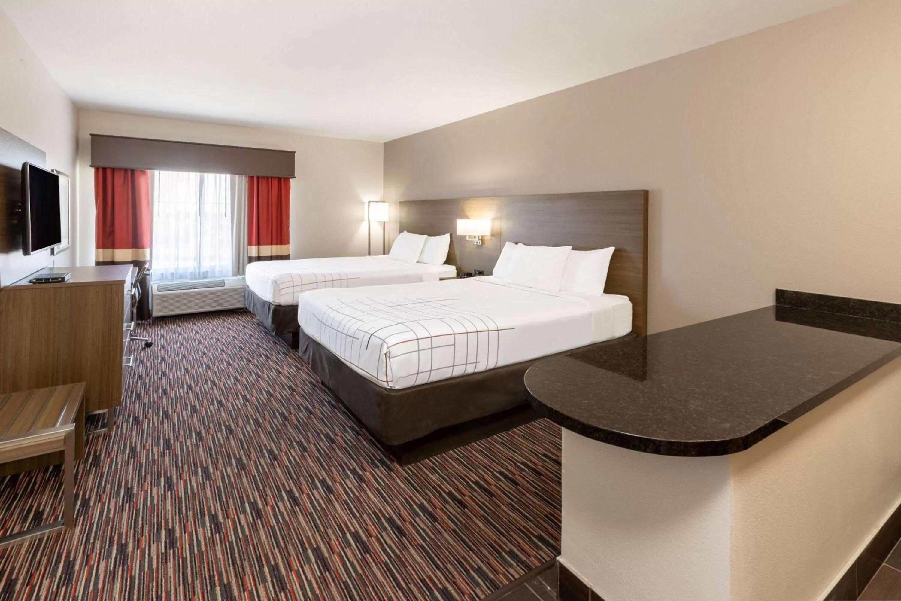 Photo of the whole room, Bed in La Quinta by Wyndham Wichita Falls - MSU Area