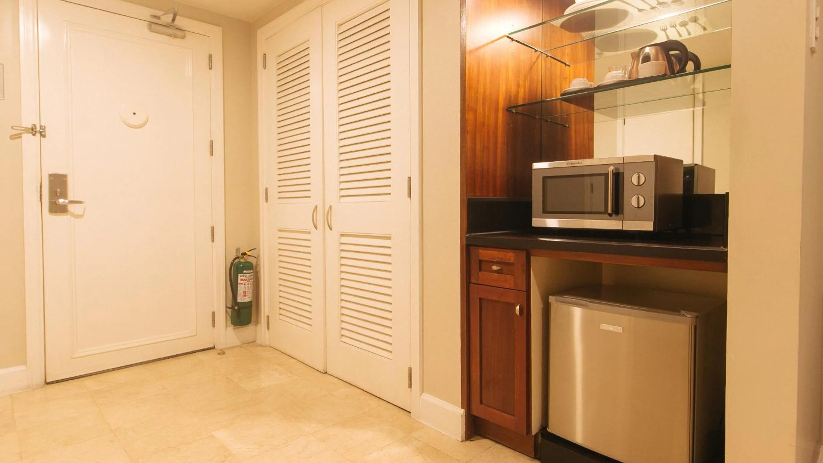 Bedroom in RedDoorz Premium at The Residences Olympia Makati